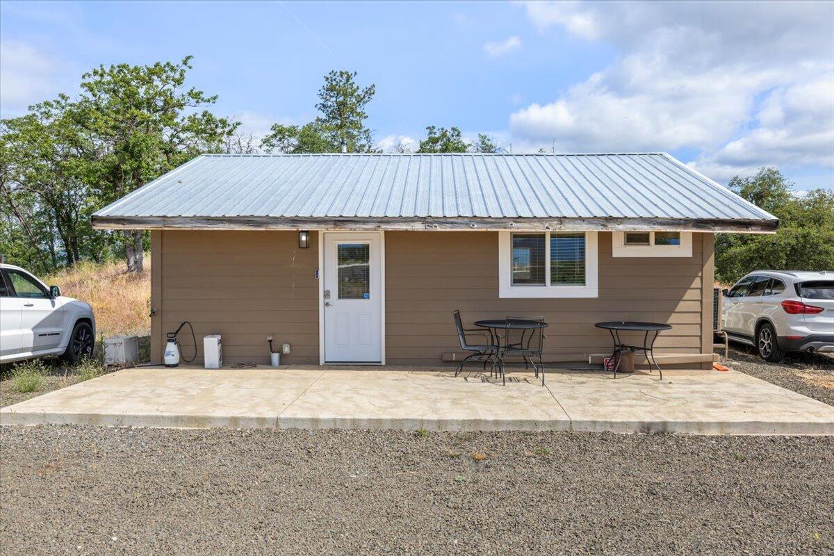 Opportunity Awaits.  Jump Start Your Dream Home! 
Set on a breathtaking 12.74 acre parcel with panoramic views, this unique property offers a rare blend of move-in-ready potential. With homesite and building plans already approved by the county, you are steps ahead in the process of creating your dream home. The foundation is ready for the 3,792 sq ft custom residence featuring 3 bedrooms, 3.5 bath. Floor plan is available in the additional documents, buyer to preform their own due diligence. While you build, enjoy living in the rebuilt home with high-end upgrades including new electrical, HVAC. drywall, siding, paint, vinyl windows, metal roof, custom cabinetry with granite countertops, and stainless-steel appliances, a sunroom with stamped concrete, a large master suite and walk in closet. This is more than just land, it's a launchpad for your dream.