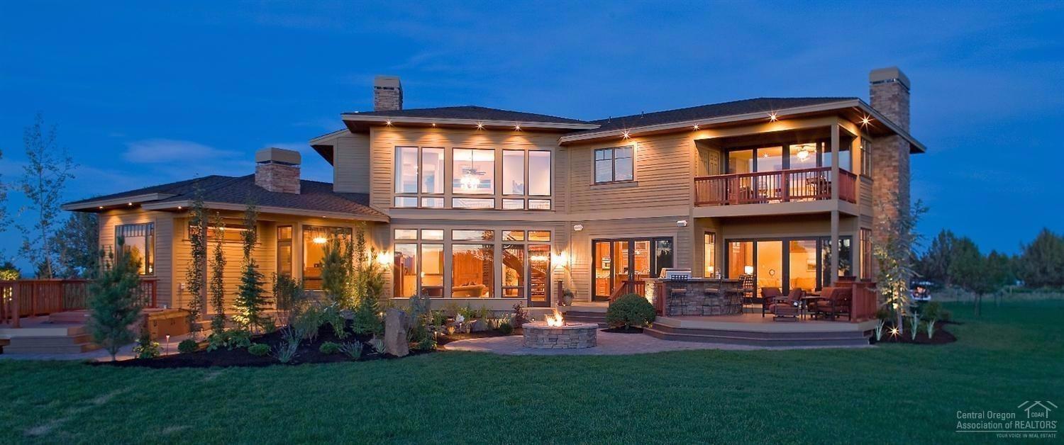 Custom home defines luxury in every way with spectacular mountain views, distinctive living areas and gorgeous tile, stone and wood finishes, radiant floor heat. Family rm, kitchen, LR and main floor master suite, wrap around decks/patios with elaborate water feature/fish pond & fire pit. Sweeping circular stairway leads to upper level. Attached 3-car garage plus shop with three bays w/RV Bay, stalls & tack room, and upstairs guest quarters. Landscaped 10 acres w/underground sprinklers.