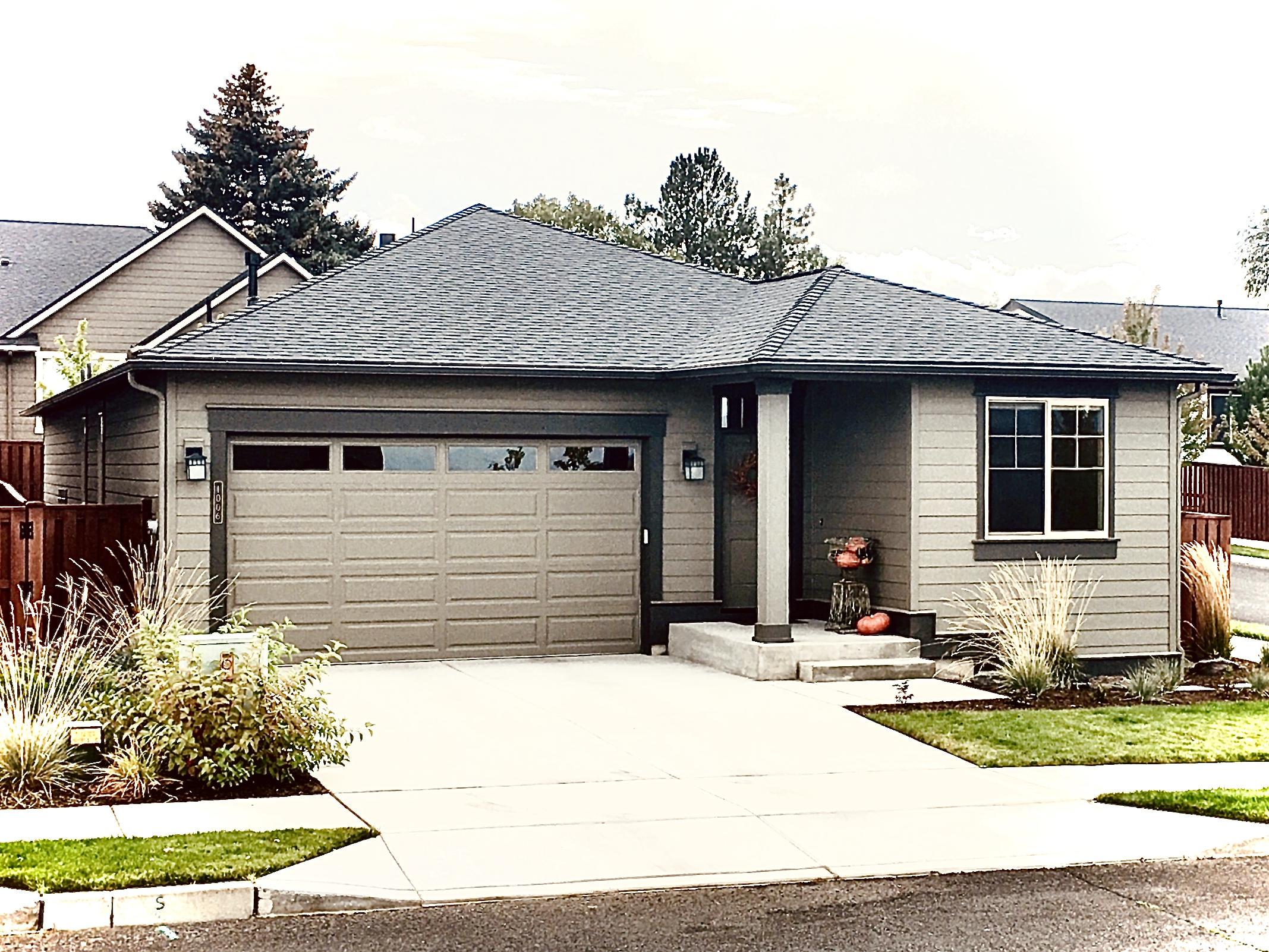 Beautiful Pahlisch single story on a corner lot!  3 beds 3 full baths, open concept with modern finishes.  White solid alder cabinets, quartz countertops, undermount sinks, SS appliances. Many upgrades!  9ft coffered ceilings, Gas range, AC, blinds, full wrap mirror in Master, landscaped backyard w/sprinklers, drip system & paver patio, solar shades.  Stone surround fireplace with blower for efficiency.  Light and bright with enjoyable outdoor living space.  Neighborhood HOA includes front landscaping, community pool, and parks.  Better than new with your upgrades built in and ready for it's new owners!