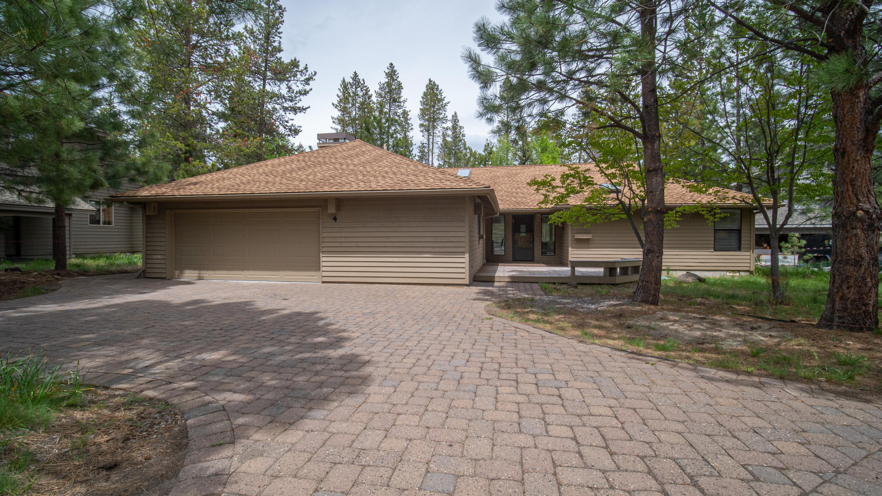 Extensive remodel in 2022! Sold furnished and ready to go for your summer enjoyment. This home features many updates including a beautiful open kitchen with bar seating and a new stainless steel refrigerator, microwave, and dishwasher, as well as updated flooring, bedrooms, bathrooms, and deck. Too many updates to list, come see this amazing home today!