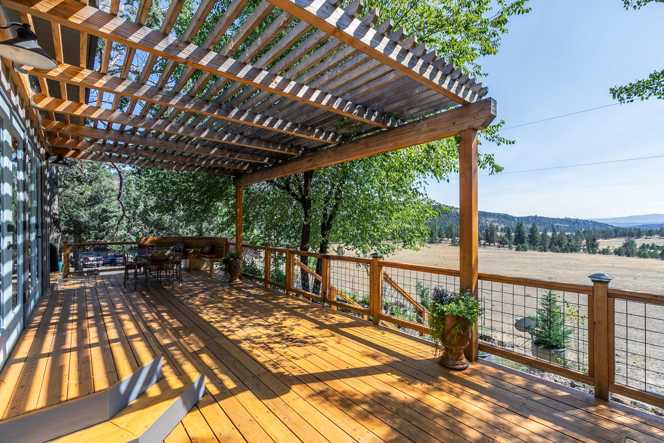 A dream location with 75+/- acres with 10 acres of well irrigation water rights located in the McKay Creek valley. The most desired valley located just north of Prineville. Completely renovated 1,842 sf, 2 bedroom, 2 bathroom, amazing mudroom with dog wash station just off the back deck. Open concept living, solid oak flooring, vaulted ceilings in living room, 2 sets of French doors that open onto a spacious deck with beautiful valley views. Chefs kitchen with quartz countertop, custom cabinets and ss appliances. Large custom dog kennel with attached run. Property is fenced, gated, 2 stall barn with tack room, outdoor sand arena, storage buildings, natural spring and approximately 2 miles from forest service land. Come enjoy this private setting surrounded by mature trees.