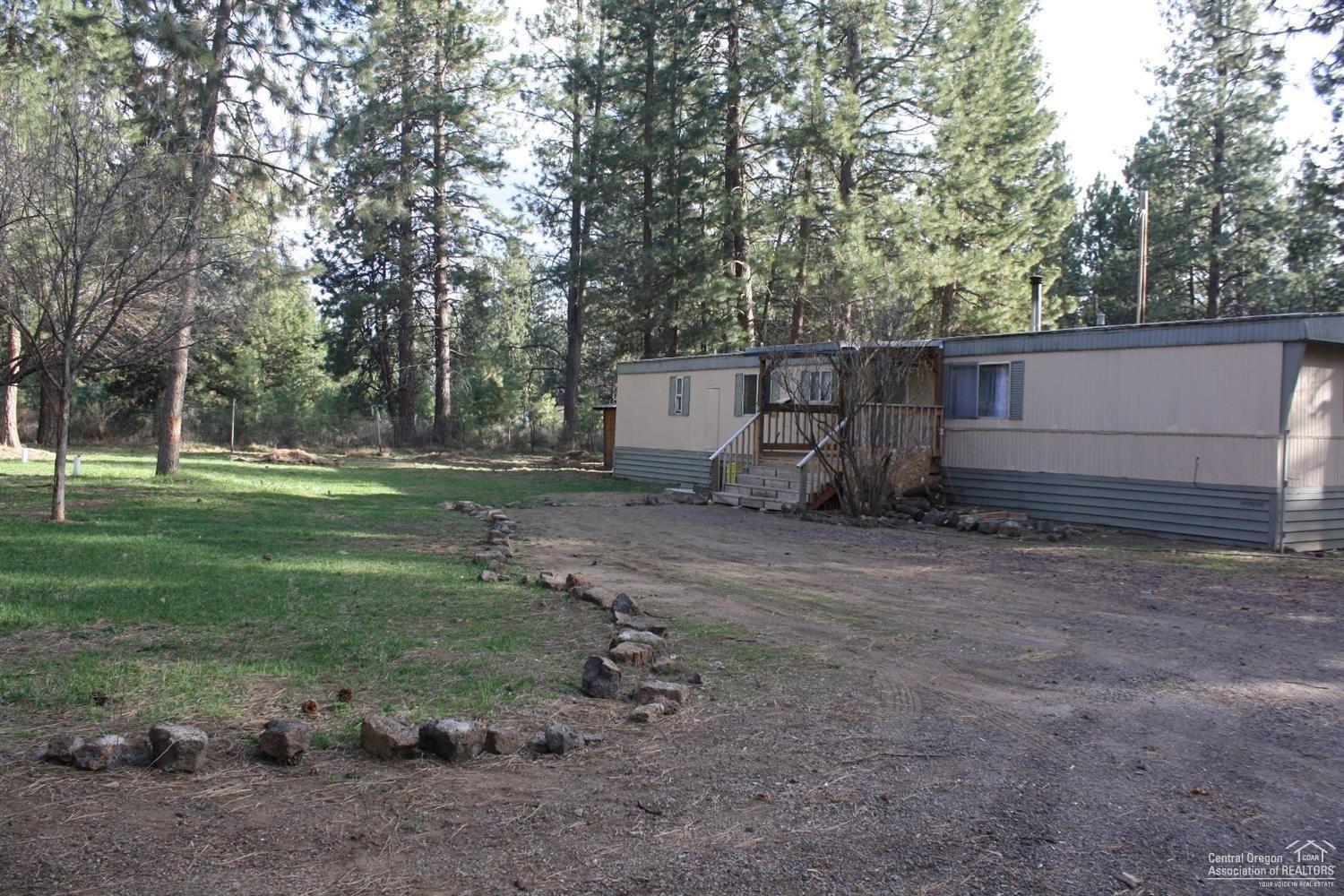 <div>Great opportunity in DRW under 200K! Keep as a rental or build a home....Construction loan? Land/Home package? Call your lender to see what they can do. This is a fully fenced, .69 flag lot, lots of privacy. New concrete septic 2003, Agate water and PP&L. Paved road with easy access to Hwy 97.<b></b><i></i><u></u><sub></sub><sup></sup><strike></strike><br></div>