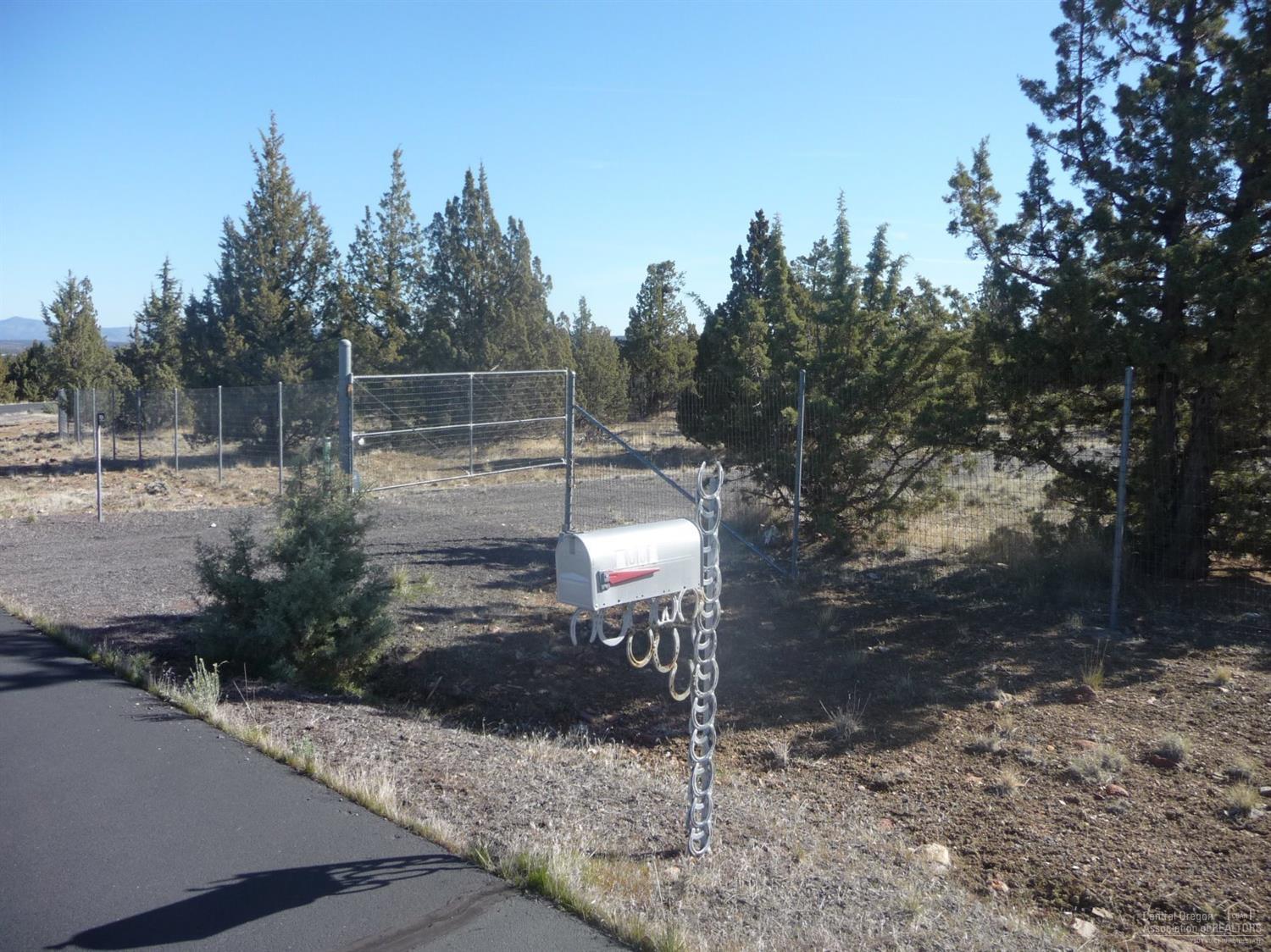 Builders or future homeowners, build your dream house on this very private juniper covered 5 acre lot in Mt View Estates in Powell Butte. Deer fenced, gated, gravel drive to home site. Avion water and power to home site. Protective CC & R's allow for horses & 4-H animals.