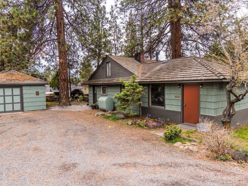 Charming mid town home on 2 tax lots. View of Pilot Butte from Kitchen Sink. Hike the Butte each morning out your front door, or mix it up on the Larkspur trail. Easy stroll to mid town retail including the new Parilla, Backporch Coffee etc. Brand new pellet stove, new master bath, new kitchen remodel with soap stone counter tops, a must see!