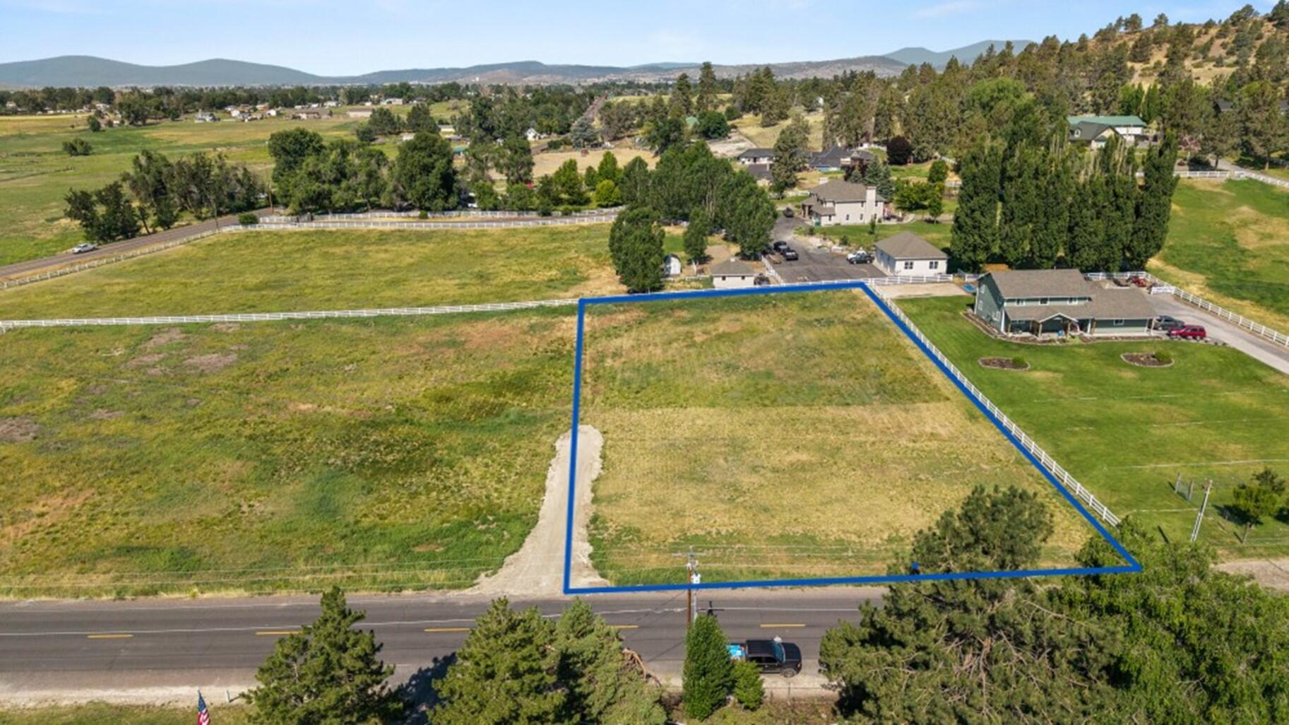 Build your dream home on this 1 acre lot.  This desirable Vale Rd. location has the feel of country but is conveniently close to town.  There is room for a shop, RVs & more.   Shared well already in place and Cap Fill septic approval sets this lot apart from others.  Power is at the road, plus it is partially fenced.  No HOA.  Ferguson/Henley Schools.  Hoping for more acreage?  Adjoining lot available too.  Boundary lines on photos are approximate.  Buyers to perform own due diligence regarding, well, utilities, uses & zoning.