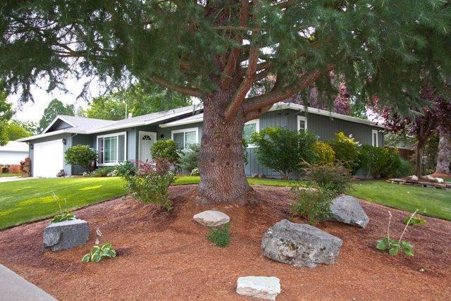 Beautifully updated and landscaped 3 bedroom, 2 bath, 1585sf home with attached 2 car garage. Kitchen with tile counters, living room with gas stove, family room, master with slider to patio, covered patio, shed, and fully fenced back yard. New features include a new roof in 2005, new flooring, updated insulation to R-38 throughout the house, new heat pump, new furnace, new hot water heater, new windows in 2008, new doors, and more. All information deemed reliable but not verified anyone considering the purchase of this property should perform their own investigation into the uses and conditions of the property.