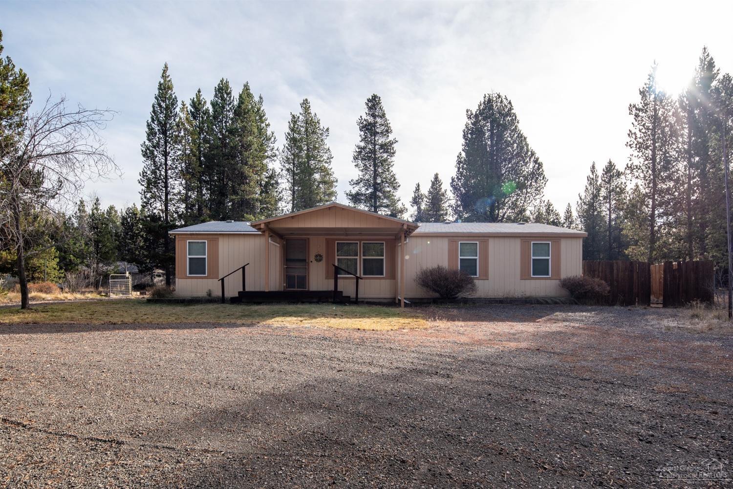 Located in the heart of Central Oregon recreation, this property has space for the family &amp; all your toys. Over 1400 sf of living space, 4 bedrooms &amp; 2 baths + large, vaulted living space. Spacious kitchen w/corner pantry, dishwasher &amp; adjoining mudroom. Laundry room offers a utility sink &amp; space for appliances, additional storage. Master Ste has plenty of windows, walk in closet &amp; dbl sinks in the attached bath. Additional bedrooms &amp; bathroom at the opposite end of the house. Outside, you'll enjoy the covered front &amp; back decks. Bunk house/storage or craft room in the back yard. 576 sf shop with attached lean to for additional storage protected from the elements. Back yard features a large fenced space for summer gardening.