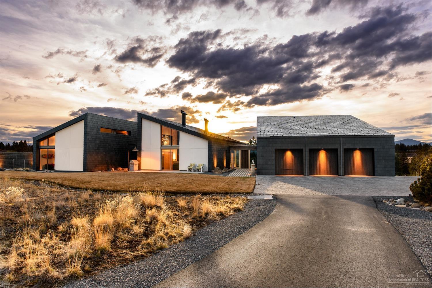 An architectural masterpiece situated on over 10 prime acres close to town with unparalleled mountain views. This contemporary piece of art features incredible detail & thought to every line & space with cutting edge technology. Soaring 22 ft ceilings & an open floor plan, this home is replete with radiant heated concrete floors throughout, high end Italian Pedini products. Designer kitchen with top of the line Miele appliances. Serene, spa-like master bedroom & bath. Solar energy. Your private oasis.
