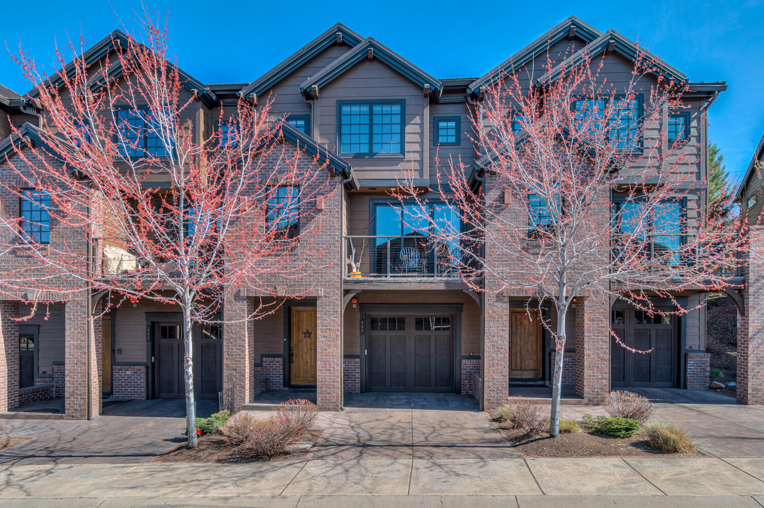 Fabulous Old Mill Townhome! Welcome to your next home or a great short-term rental investment property. Your home is steps from the Deschutes River, the Old Mill District, and Hayden Homes Amphitheater. It is a perfect spot to enjoy everything locally and launch your adventurous spirit whether on the river, the trails, or in the mountains.  
 
This fully furnished turnkey townhome includes a main level consisting of a fully stocked gourmet kitchen, dining room, living room with a gas fireplace, central A/C/heating, hardwood floors, a balcony off the living area, a reading nook, a bedroom with full bath with across the hall, and a 250 sq. ft. garden patio with dining table and gas grill. On the upper level, you will find the primary suite with mountain views, ensuite full bath and walk-in closet, laundry room, and a third bedroom with ensuite full bath.  The ground floor includes a two car tandem garage and driveway parking. 

Come enjoy the Bend life right outside your doorstep!