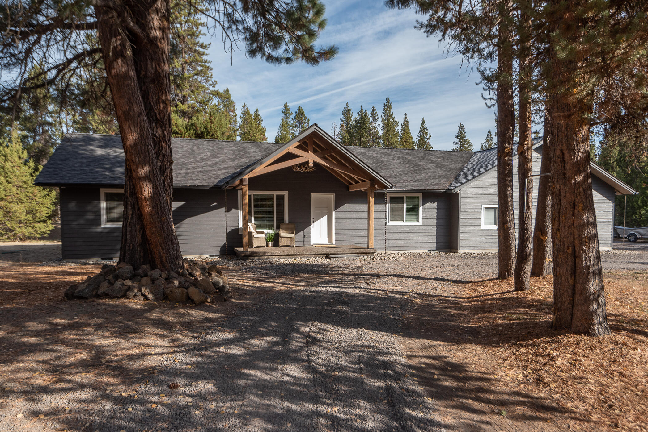 If you are looking for a private slice of Paradise look no further. This flat acre lot has a beautiful, like new single-story home nestled in the trees. Fully fenced and plenty of room for parking your toys or building a shop. Light and bright great room with beautiful hardwood floors, solid surface counters and tiled entry and baths. Nice separation with the master Suite and two large guest rooms. New wood stove to take the chill off those Central Oregon evenings. Lovely covered front porch as well as a covered back patio perfect for entertaining or relaxing. The garage is extra deep and three bay's wide with attic storage above. New ATT septic system just installed.
Minutes to river fun and the Sunriver Village, everything you could want is at your doorstep!