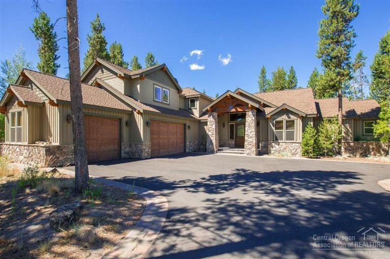 Can you say Luxury and Fun! Welcome to Sunstone Lodge in Caldera Springs. This custom build home is amazing inside and out. Entertainment areas for all. Chef's kitchen inside and out. Outdoor kitchen has gas BBQ, a beverage center and a built in TV, music system and heater. The covered outside paver patio area has gas fireplace, 42 TV and audio system. Large timbered great room. 2 master suites on the main floor (home sleeps 16). Upstairs is a bonus room/game room built for fun. Come Enjoy!