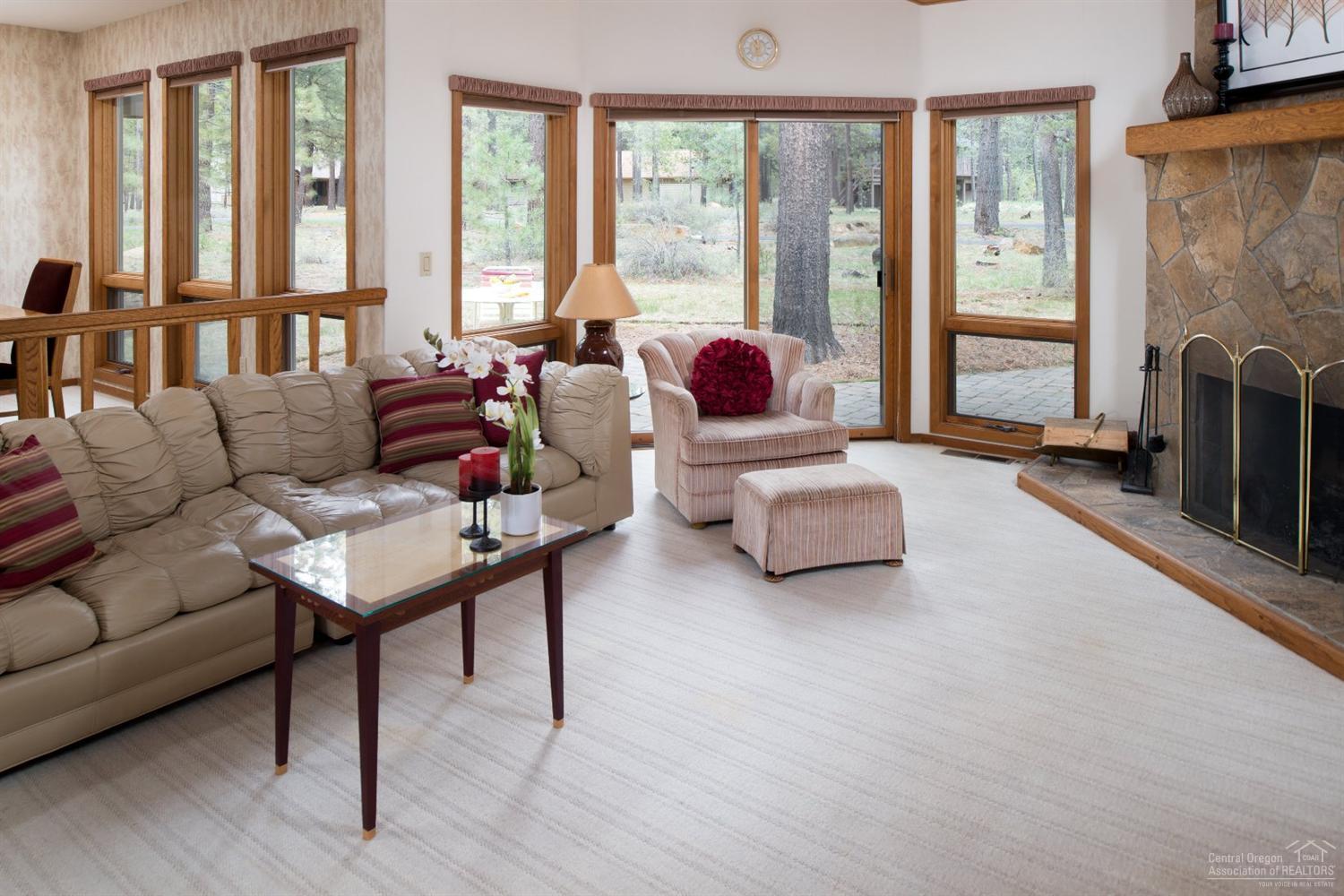 Are you looking for a home with tons of ample natural lighting? Located on the quieter North end of Sunriver with easy access to the National Forest, bike paths, woodlands GC & North Pool. Open great room floor plan with wood burning fireplace. Master suite located on the main level with two additional bedrooms upstairs. Enjoy a paver back patio and all the ponderosa trees that surround this park like setting. Hot tub area wired & ready for a tub.