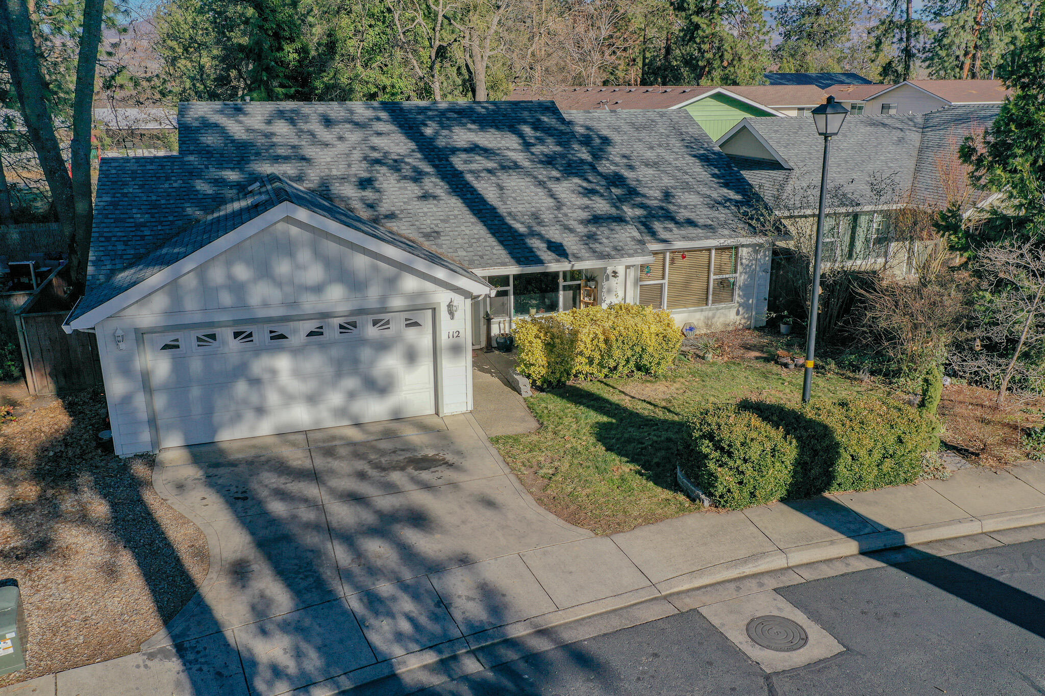 Very nice single level home on private cul de sac. Small park included as part of the HOA. Features include tile counters in the kitchen, hardwood floors, vaulted ceiling and ceiling fans. Nice open feel to the home. Attached two car garage. Great backyard with hot tub Mature trees throughout the neighborhood make for a rural feel.