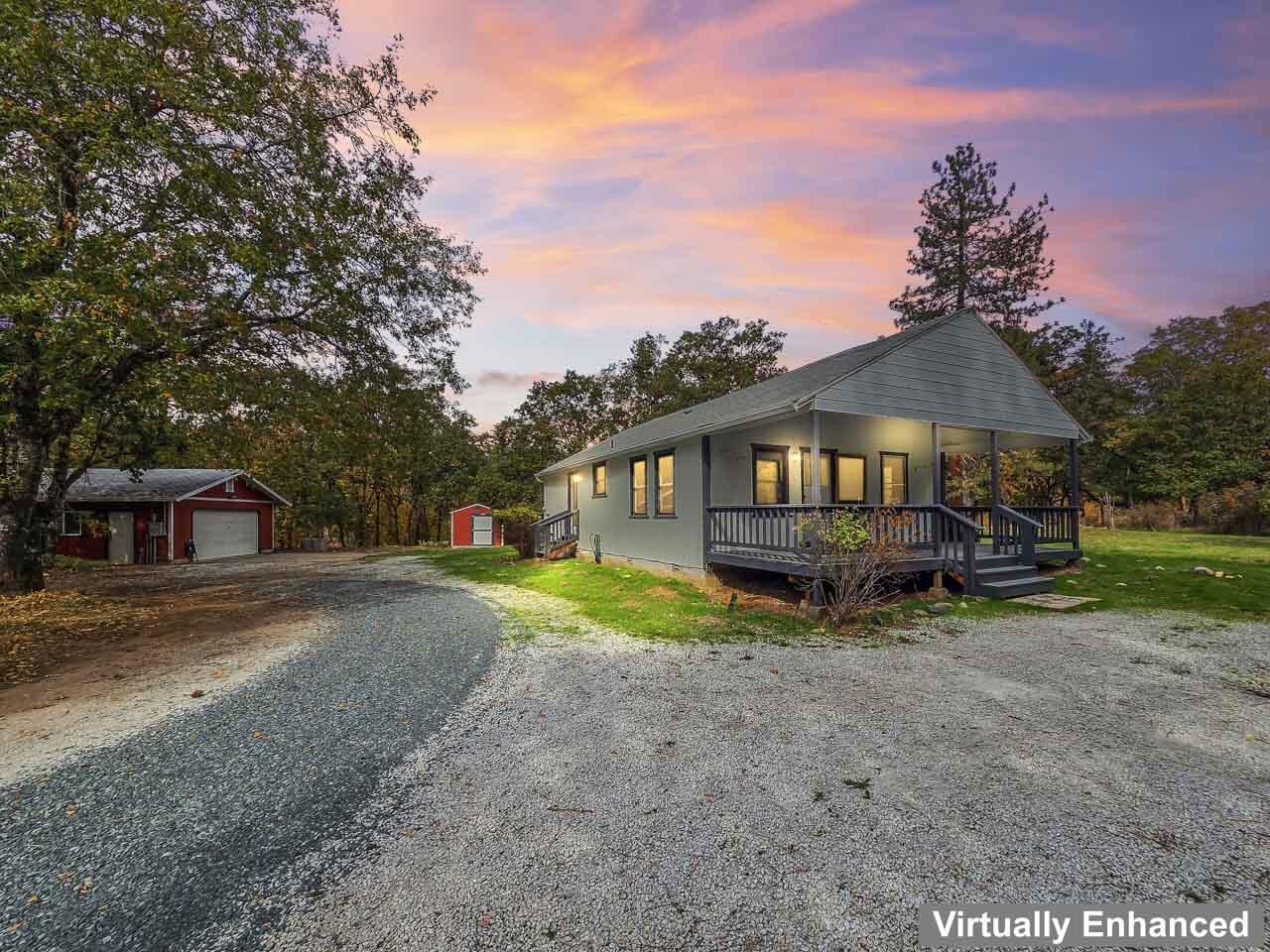 Cute, Cozy and tucked back away from the road with opportunities for a farm or horse ranch on 9.12 usable acres. With a seasonal creek and pond. Mulitple heavy duty buildings some set up with power. Recent Well log came in at 7.3 GPM. Well built 2 Car Detached Garage. 2 Generac generators, one for the farm portion and 1 for the home. Chalet Frame Constuction 2 Bedroom old style Charm, with a Laundry room, breakfast area and Great room, original hardwood floors throughout. Water storage tanks for farming and secondary power source. Great usable fenced property for livestock, horses, goats, chickens etc. May be subdevidable, check with the County Planning Department. This property should qualify for all types of financing. Nearby Shopping in Grants Pass, with Medical Care/Hospitals. Not far from parks. lakes and rivers nearby. Hiking, biking, swimming, fishing, peace and quiet.  Possible Owner Financing. Buyer to perform due diligence as to uses and conditions