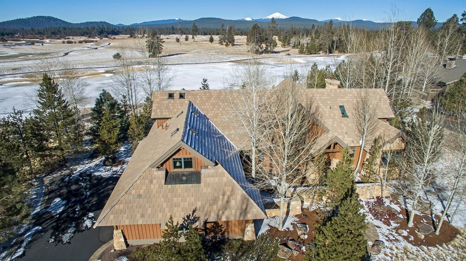 Spectacular golf and mountain views, expansive meadows, and meandering rivers await at this premier Crosswater residence. Nestled on a full acre amongst mature ponderosa and aspen trees, this regal Sun Forest estate offers 3 bedrooms, 3.5 bathrooms, abundant office and bonus room in over 4800 square feet of living space. Timeless design showcases the finest Pacific Northwest architectural style that celebrates the majestic setting of this private residence. This is the intersection of lifestyle and luxury!