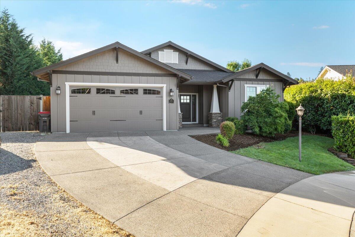 Located in a highly desirable East Medford neighborhood, this beautifully maintained 3-bedroom, 2-bath home sits on a generous 0.24-acre lot at the end of a quiet cul-de-sac. Step inside to soaring 10-foot coffered ceilings that create a bright, open feel. New carpet in the living room and bedrooms adds fresh comfort and style.

The kitchen is both functional and elegant, featuring granite countertops, rich wood cabinetry with under-cabinet lighting, and a convenient breakfast bar—perfect for morning coffee or casual meals.

Outside, you'll appreciate the mature landscaping and private backyard, ideal for relaxing or entertaining. The expansive lot offers ample parking and room for all your toys—RVs, boats, or extra vehicles.

Don't miss this opportunity to own a home that combines comfort, space, and location!