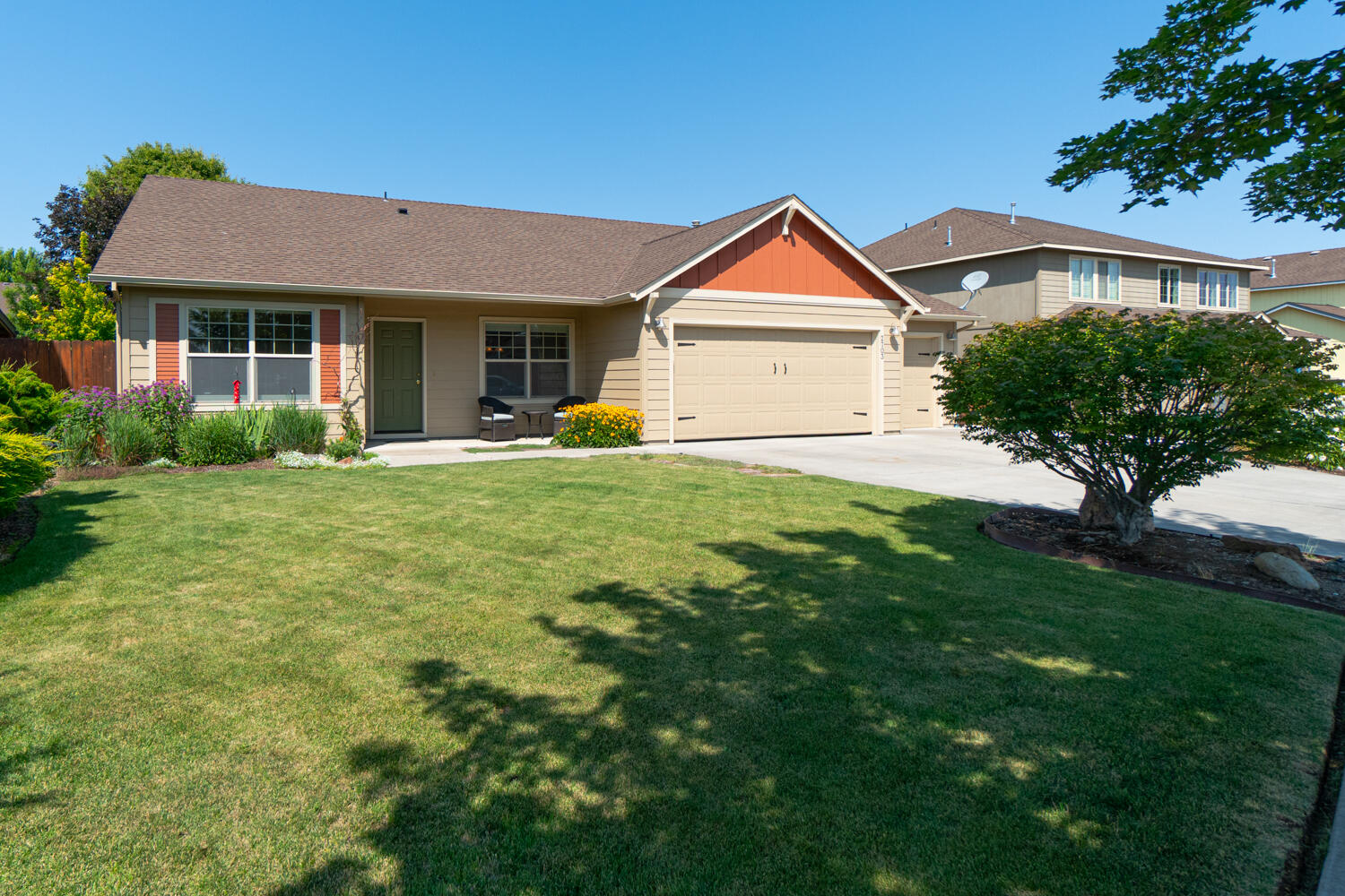 Located on the NW side of Redmond near Tom McCall/Elton Gregory sits this immaculate 4 bed, 2 bath single level home. Vaulted great room w/ an abundance of natural light, ceiling fans throughout, Hunter Douglas top down bottom up cellular blinds, wood wrapped windows, stone surround gas fp w/blower, hearth & mantle. Kitchen ftrs white cabinets, granite tile countertops, SS dishwasher, gas range, & plenty of cabinet space. Lg primary bedroom w/glass door to patio, bath w/dbl vanity, shower, walk in closet. 3 additional bedrooms share a full bath. Outside you'll find your own personal oasis w/large concrete patio w/pavers, LeBlanc Decks built the pergola, curved concrete paths, raised garden beds w/drip system, mature landscaping, fully fenced backyard, sprinkler system in front/rear, & double door shed stays! Triple garage, gas hot water heater + gas forced air with A/C. Easy access to HWY 97 and just a block to Quince Park - LOW Taxes too! Home is well maintained & move in ready.