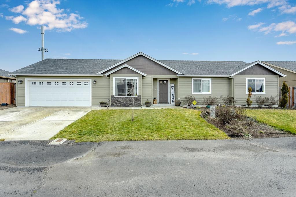 Fantastic newer home in Eagle Point! Tons of natural light flow throughout this super pretty home. Great kitchen with granite countertops, eating bar, laminate wood flooring, stainless steel gas stove, microwave and dishwasher package. Lots of storage in kitchen as well as a pantry. Plenty of space in the dining room for a large table. Large master suite with granite countertops, walk in closet and a second closet. The garage is very deep and has tons of extra space for storage or work out area. The backyard backs up to Eagle Point High school football field property so there are no homes behind home. There is also no thru traffic on this street. Just a wonderful home on a great little street!