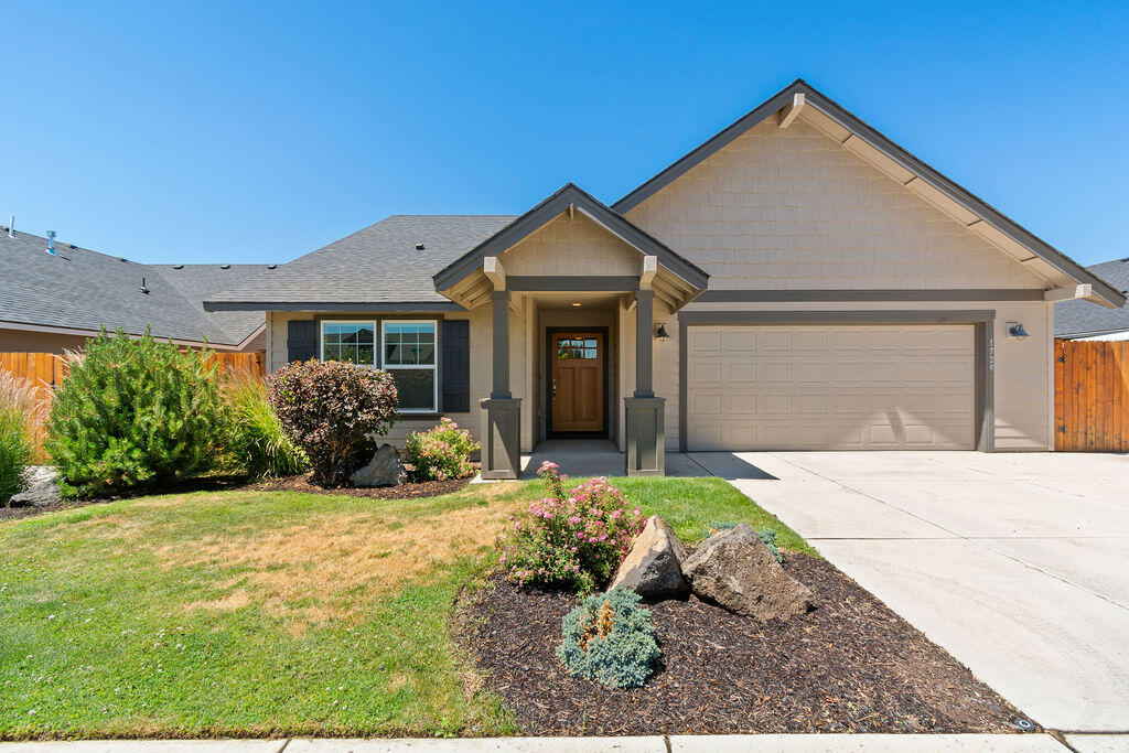 Looking for a Single-level home with a dedicated, safe spot to park your RV? This home has a gated, gravel surface RV parking spot. The open-concept layout features a spacious kitchen with quartz countertops, stainless steel appliances, and a large island perfect for entertaining. Close to shopping, the Hospital and Smith Rock. Move-in ready with ALL APPLIANCES included. A/C will keep you cool on warm days and the beautiful Gas Fireplace will keep you warm on those chilly nights! Relax in your fenced backyard under the covered patio or walk less than a block to the neighborhood park for some fun.