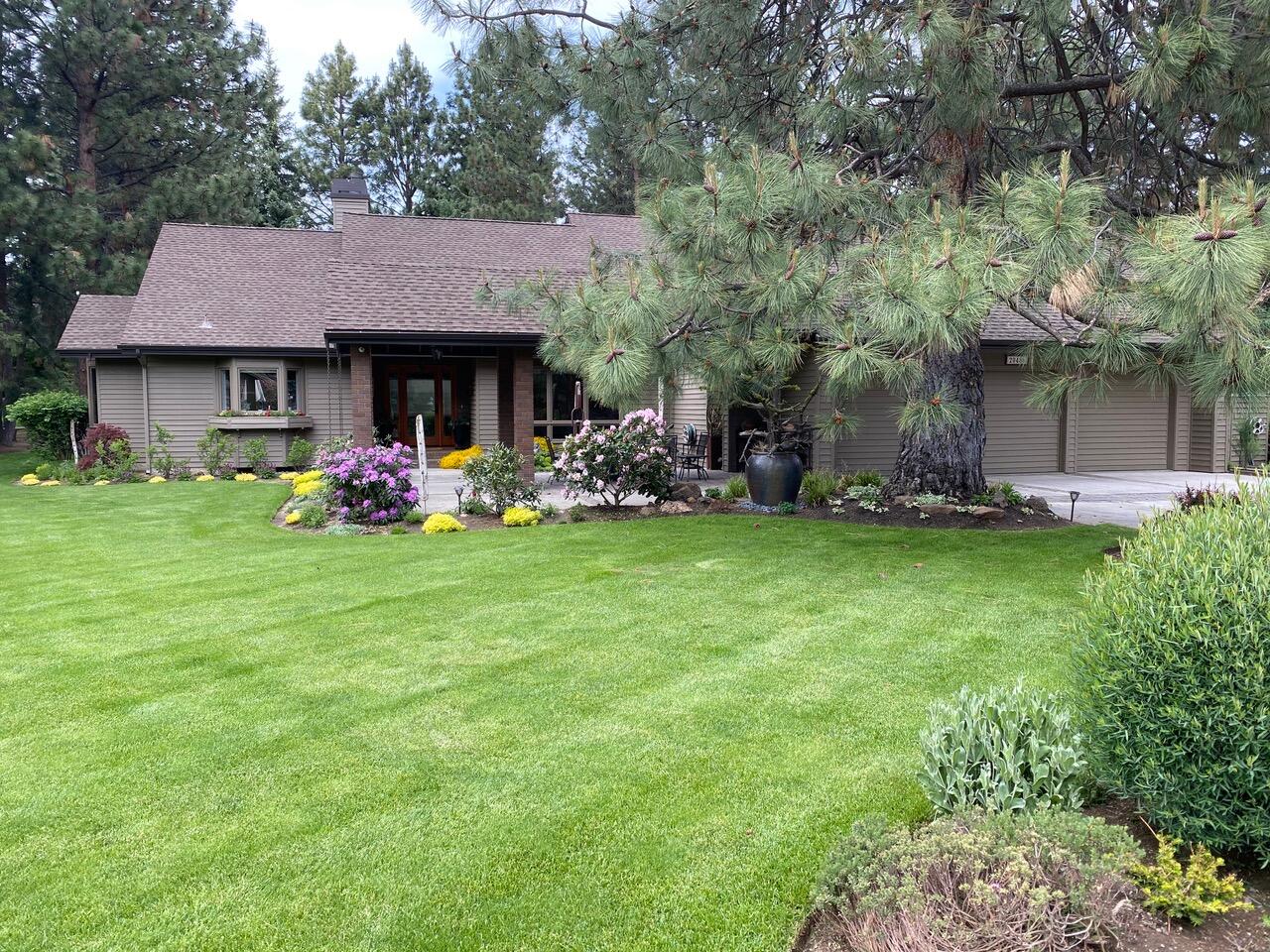 Welcome home to this stunning SINGLE LEVEL beauty in the gated neighborhood of Mountain High. With a multitude of updates it really is something to see! Nestled among the pines on over 1/2 acre in a parklike setting on a quiet cul-de-sac. A  covered patio/breezeway at the entrance welcomes you to into your own personal sanctuary. Experience a blend of modern design & rustic elements to create a warm and inviting space. Newly remodeled kitchen & family room create a cozy atmosphere that is sure to please. Possibilities galore in the recently constructed, 600 sq. ft. addition w/a separate entrance & porch. Complete with full bath, professional lighting, closet & a basement shop/storage space underneath. Perfect as an art studio, gym or for multi-generational living. Out back, gather around the natural gas fire pit or relax in the hot tub after a busy day in Central Oregon. Enjoy the community pool and tennis courts in the summer. This home has it all!