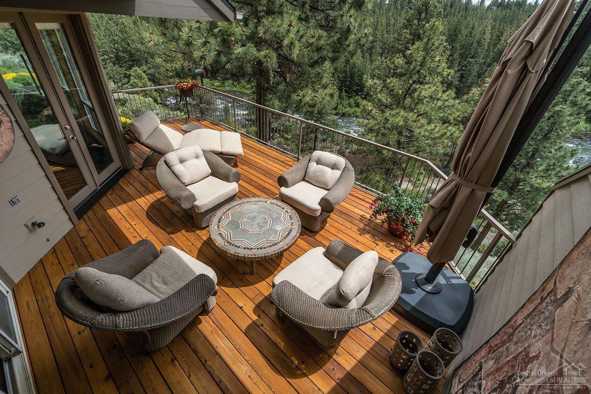 3 cedar decks on the river w/floor to ceiling windows capture unblockable river/canyon views from pvt bluff top setting. One of a kind-over the top remodel-impeccable-awaiting buyer who wants it ALL!Vaulted ceilings/hickory/travertine floors/FP.Real weathered copper backsplash in wet bar & kitchen/slab granite counters/snack bar & bth counters.Kitchen-SS Kitchen Aid appliances/graphite sink/brushed nickel faucets/pantry.Art lighting on dimmers.2 master suites w/decks & river views. Comm pool/spas/rec rm