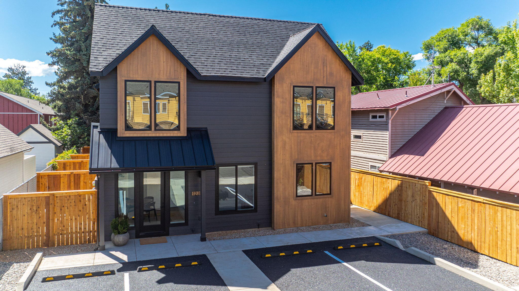 Discover modern living with four brand-new construction townhomes located in the heart of downtown Bend. Perfectly situated across the street from Jackson's Corner - close to the Old Mill District and downtown's vibrant shops, restaurants, & entertainment, this is the ideal location for those looking to embrace urban living with the convenience of low-maintenance luxury. These homes feature two spacious primary suites, each with its own private ensuite bathroom for maximum comfort & privacy. Designed for low-maintenance living, these townhomes allow you more time to enjoy Bend's incredible outdoor & urban activities. Enjoy energy-efficient design with zoned heating/cooling for year-round comfort and minimized utility costs. Don't miss the opportunity to own one of these exceptional townhomes in downtown Bend. Schedule a tour today and experience all these homes have to offer!