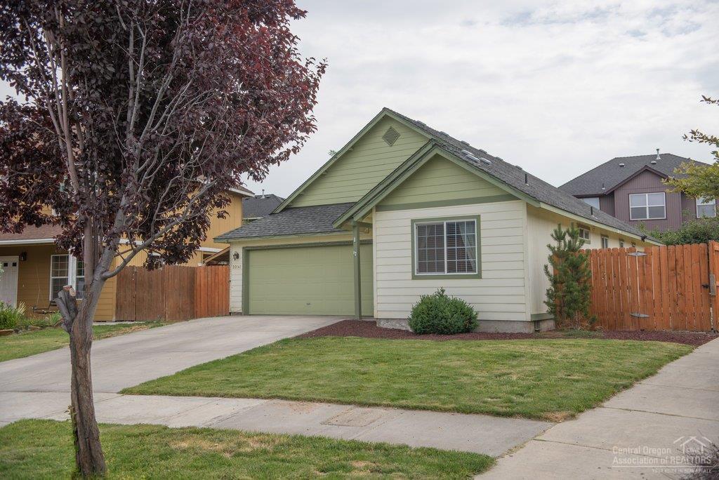 Immaculate and beautifully decorated 3 bed/2 bath single level home that has been carefully maintained on a corner lot. Tile entry with newer laminate flooring in hallway, Great Room, Kitchen and Dining area. Spacious, open floor plan with vaulted ceilings. Kitchen has a large pantry, gas stove and newer dishwasher. Laundry Room with cabinets. French door leading to back deck and private fenced backyard with paver patio/pergola and fire pit. Good location with easy access to shopping, schools and parkway.