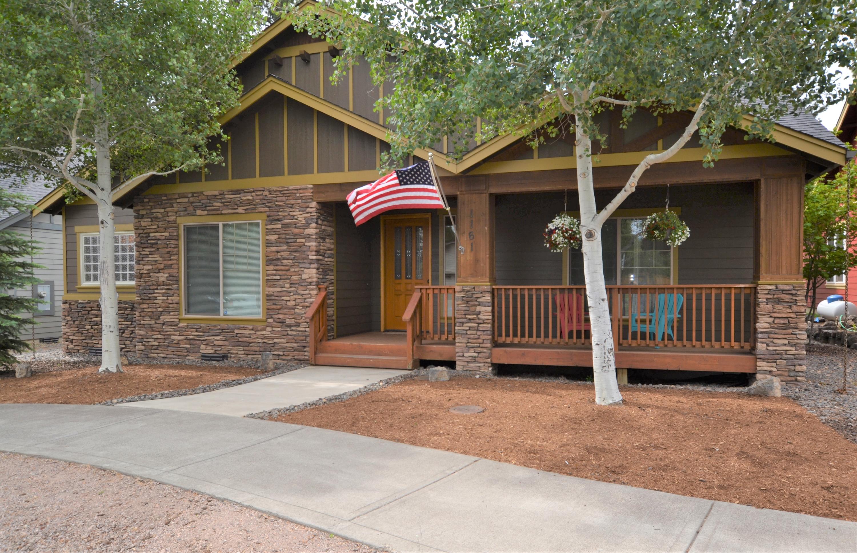 Welcome home to this charming single level northwest style home in the heart of Sisters. As you enter the front foyer there is a large coat closet and formal living room with propane fire place and vaulted ceiling. The gourmet kitchen features stainless appliances, kitchen island/breakfast bar with granite counters and plenty of storage in the custom built-ins or in the full size pantry. There is a comfortable family room to the rear of the home with trayed ceilings and direct access to the covered and gated back deck. With two generous sized bedrooms there is plenty of room to house guests. The master suite highlights a walk-in closet and the master bath boasts a jetted soaking tub, tiled walk-in shower, double vanity and enclosed toilet room. Beautiful hardwood floors and travertine tile throughout the home. This home also features dual water heaters, heat pump, paver patio with privacy fence and new interior paint. Close to downtown Sisters, your next home awaits!
