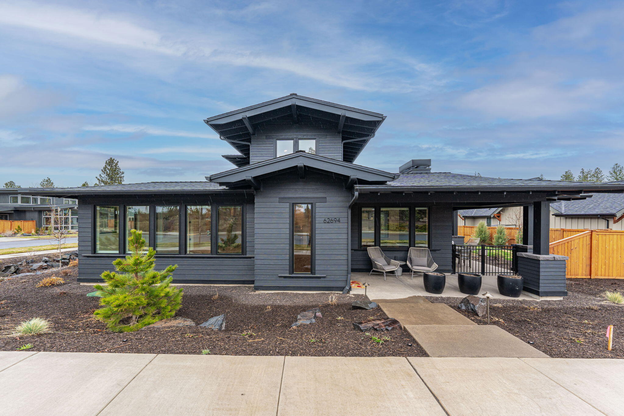 Picture life on a generous corner lot w/ Cascade Mtn Views across from your neighborhood park & trails in Bend's Shevlin West community. This newly built home, complete w/ an open concept floor plan, includes a primary on the main, chef's kitchen, great room, a dedicated office & generous laundry/mud room all on the main level; two additional bedrooms, full bath & flex space complete the upstairs. Kitchen is outfitted w/ an enviable pantry, gorgeous island equipped w/ prep sink & additional storage. High end, smart appliances & stylish pendant light fixtures. Great room w/ vaulted ceiling, gas fireplace, views of the Cascade Mtns & park across the street. The primary suite offers access to your patio, king sized walk-in closet, soaking tub & incredible full tile shower. Picture morning coffee on your covered front porch or evening meals on the back patio. Several outdoor seating areas make it easy to delight in sunsets or provide a private respite from the chaos of life. Welcome home.