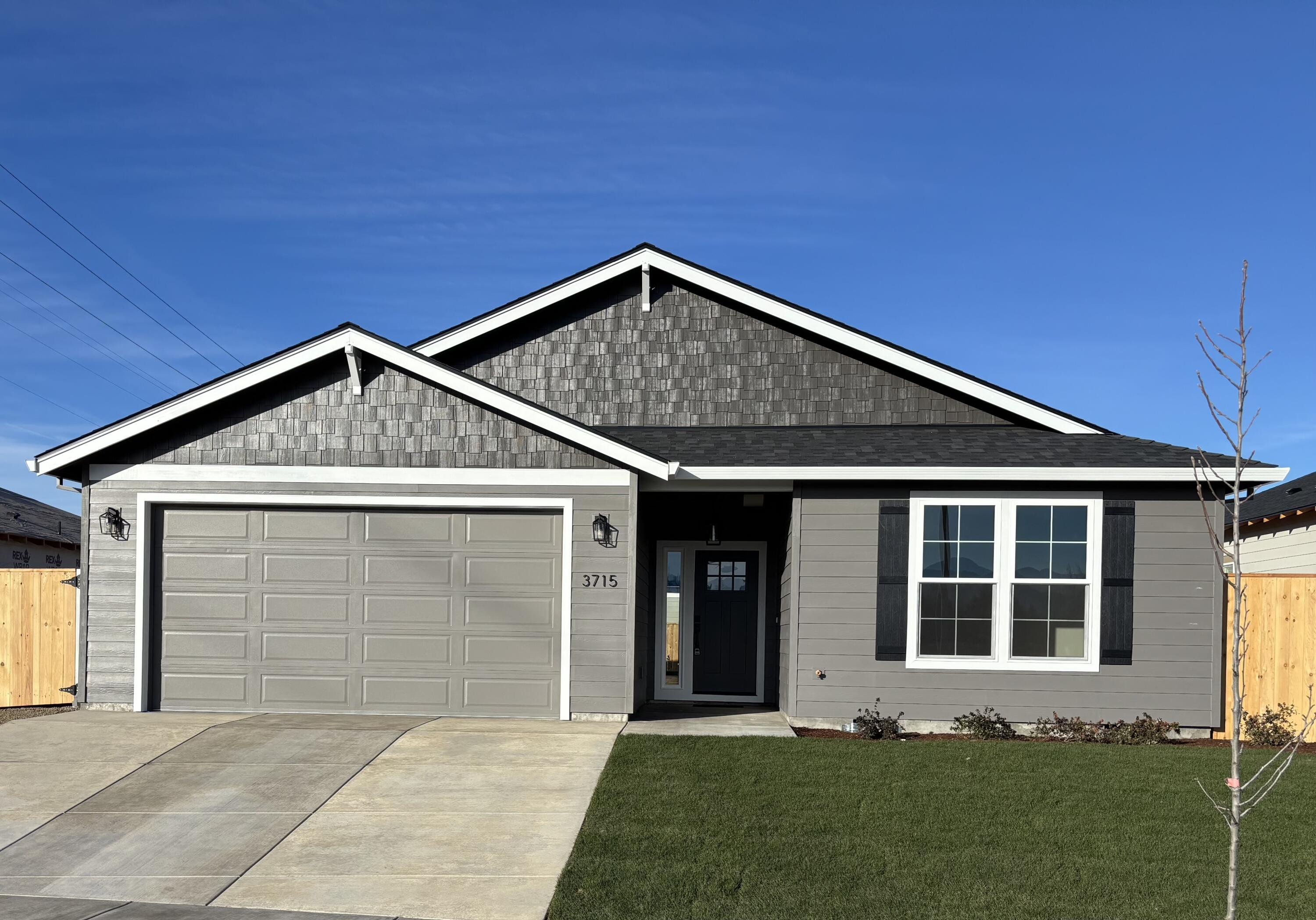 Brand new 3-bedroom home in one of Medford's desirable newer subdivisions! Enjoy modern finishes, and thoughtful design throughout. Features include a large kitchen with stainless appliances, laminate flooring, and a large primary suite. RV parking for additional storage, and a lower maintenance yard make this this a perfect home. Builder is currently offering $10,000 towards closing costs, or a buyer rate buy down.