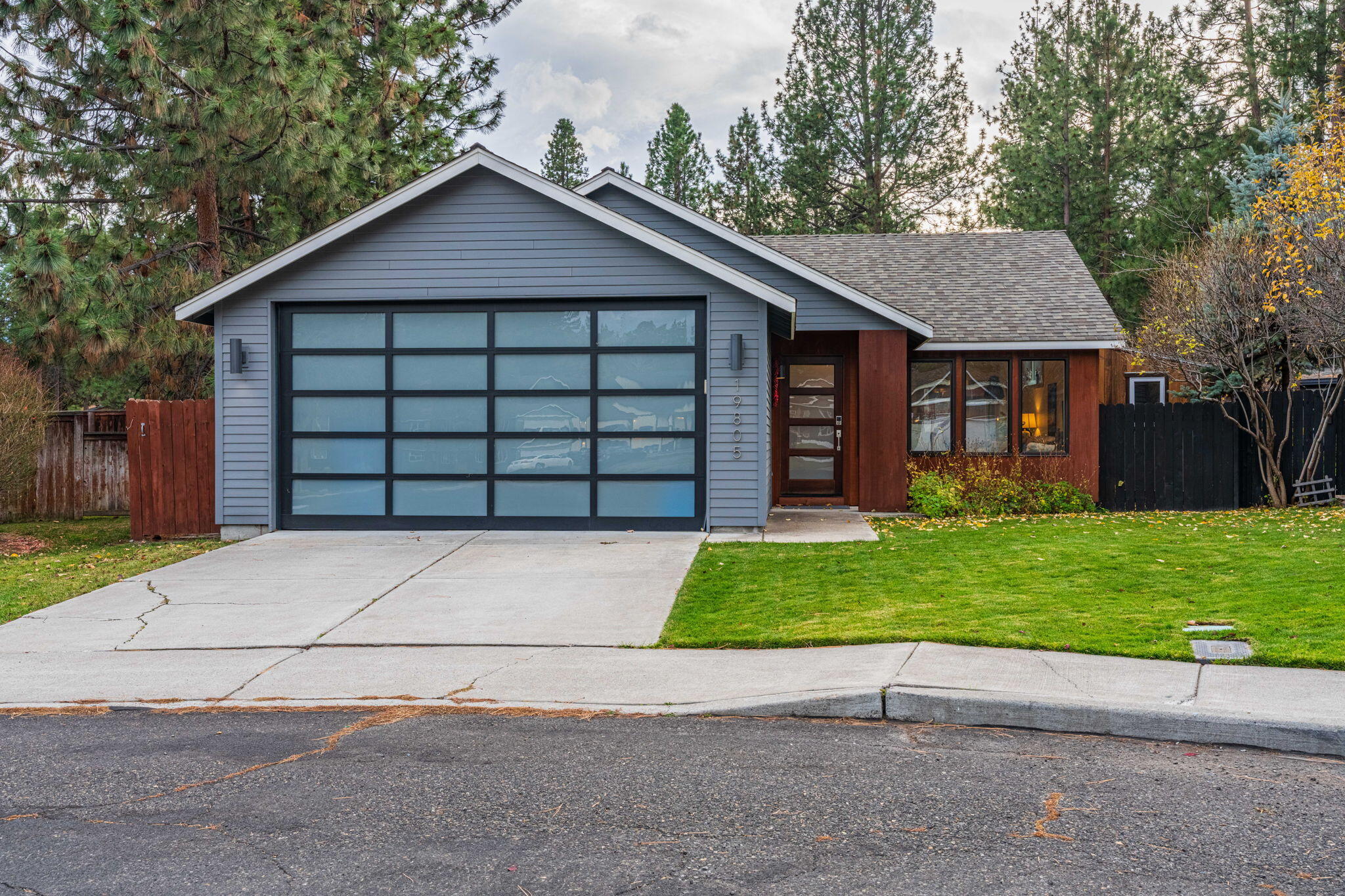 Discover this inviting 3-bedroom, 2-bath home in a peaceful West Bend neighborhood. Fully updated in 2017 with fresh interior/exterior paint, quartz countertops, modern cabinetry, and durable luxury vinyl plank flooring throughout. The primary suite is a spa-like retreat with a custom-tiled glass shower and heated floors. Move-in ready features include updated plumbing/electrical fixtures, recent garage door, smart thermostat, and efficient appliances. Outdoors offers a private, beautifully designed backyard with covered patio, hot tub, low-maintenance landscaping and a handy shed — perfect for relaxing or entertaining. Lightly lived-in and meticulously maintained, this home suits first-time buyers, active lifestyle families, or savvy investors. Enjoy immediate access to the Deschutes River Trail, miles of walking/biking paths, parks, Old Mill dining, and quick routes via the Parkway. Experience Bend's outdoor culture and convenience with a ready-to-move-in home.