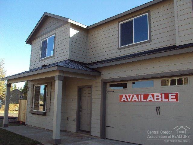 The Teton Duet is the perfect home for those in search of room and comfort in a two-story plan. Upgrades include: 8' tall garage door, den option, propane fireplace with flatwall, 4 craftsman trim, wood wrapped windows great room area, oil rubbed bronze hardware, added windows, A/C heat pump, fencing and more. This home is attached on the garage side to another Teton duet. Backyard and one side yard only. Move in ready!