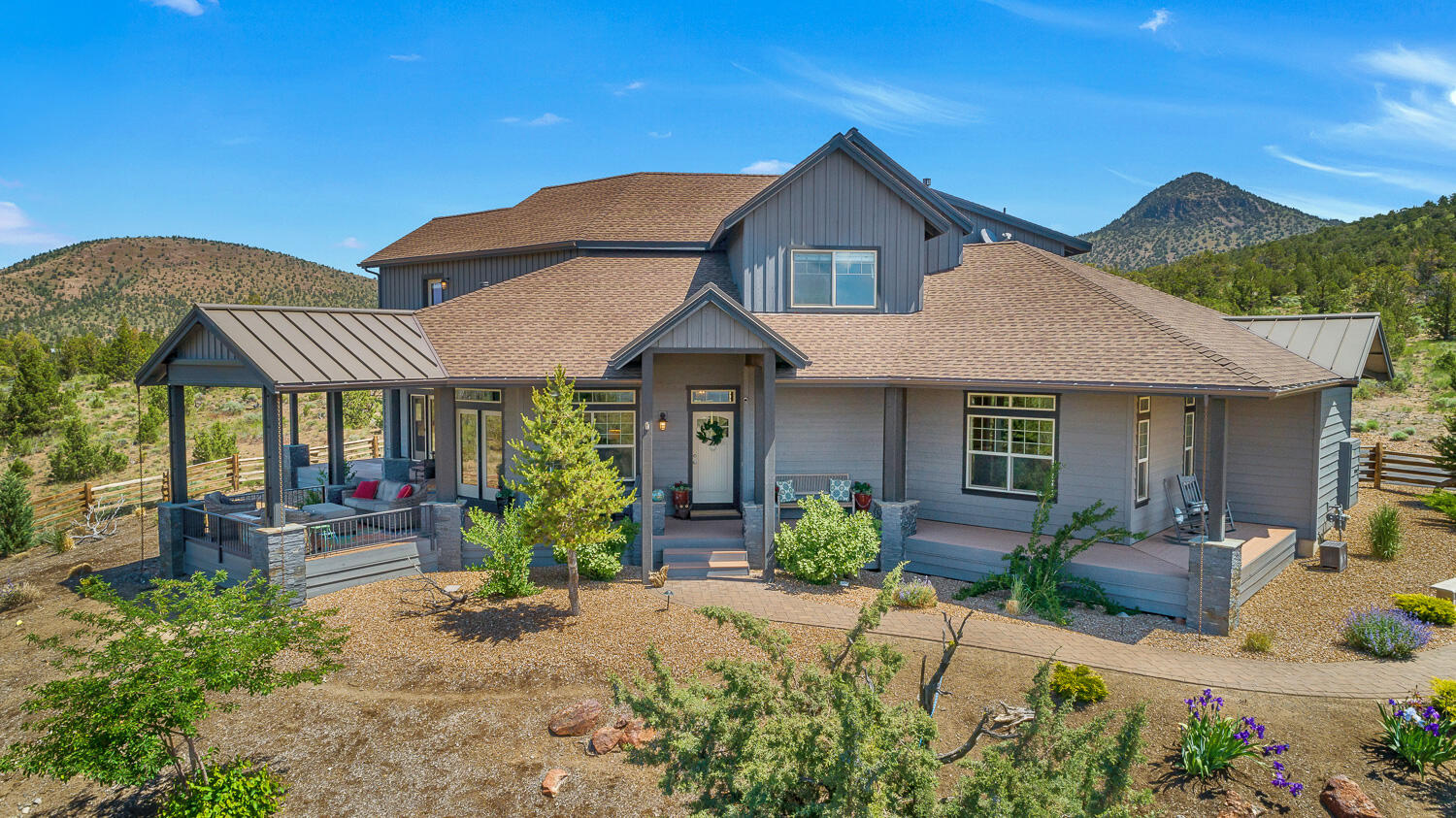 Breathtaking Cascade Mountain views & privacy from this one of a kind NW home perched at the top of the 2.41 acre property and backing to acres of common area and BLM. On 2 combined lots to ensure privacy and expansive unobstructed views you will want to sit and stay awhile on the peaceful wrap around deck with firepit and automatic patio screens. Inside you will find quality finishes throughout, with a beautiful primary on the main, as well as a cozy den, a second primary option upstairs w/private deck, a 3rd guest bedroom, a loft area, and a bonus/entertainment room w/wet bar. All of this as well as the amazing Brasada Ranch member benefits; athletic center, an adult only pool, as well as a lagoon pool with a water slide, 18 hole award winning golf course, tennis courts, spa, restaurants, equestrian center and more. This all just scratches the surface, you must come see for yourself!