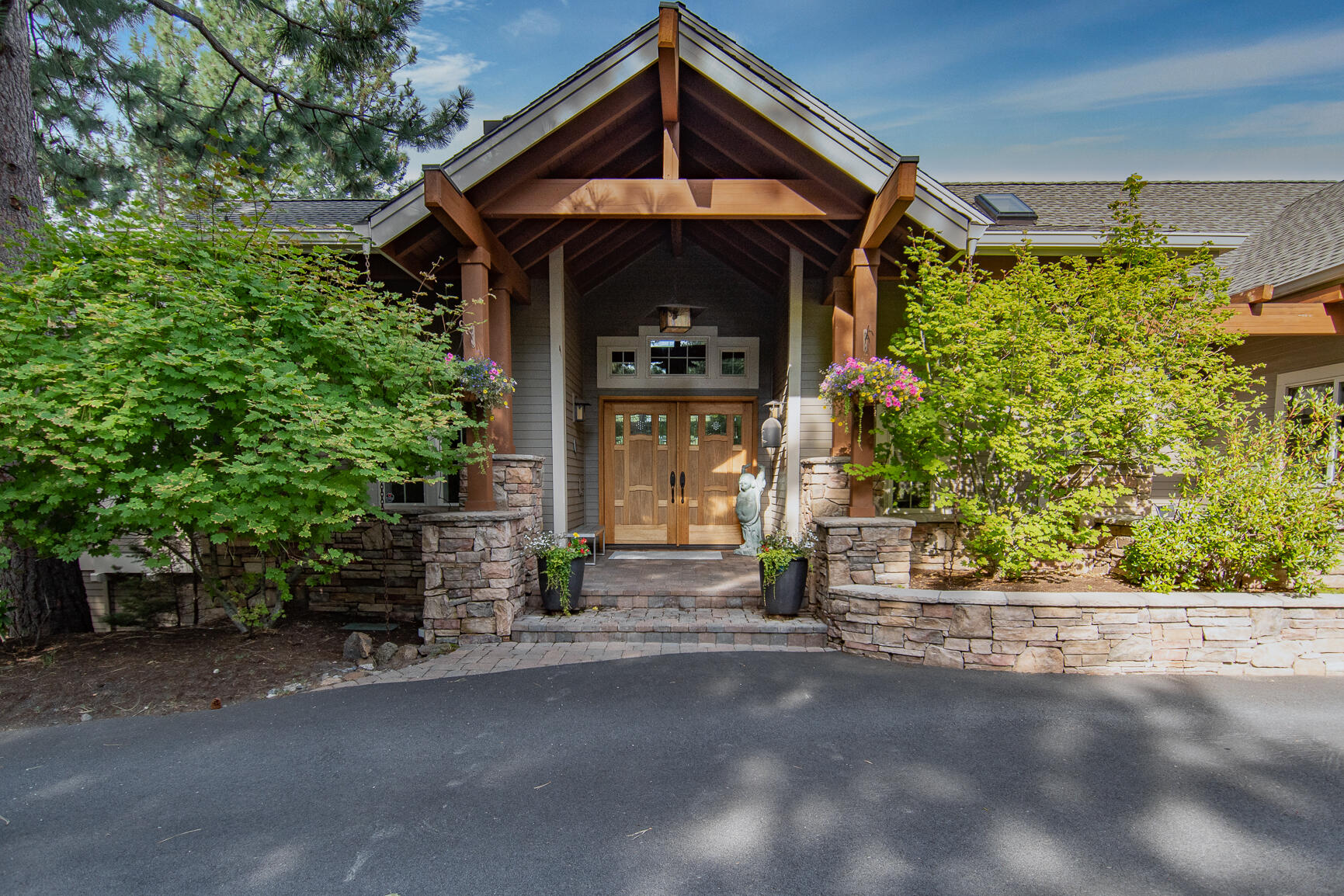 Beautiful Awbrey Butte home with Cascade Mtn views!  Privacy and tranquility and so close to everything Bend has to offer. Primary BR/Bath, spacious office with built-ins, amazing studio all on main level. Open great room living with modern kitchen & large dining area that all open to deck with stone pillars that has stairs to yard below. Studio has Montana mossy rock wall, incredible reclaimed wood beams & vaulted ceilings. Lower level has large media room with wine storage & wet bar along with 3 bedrooms (two with ensuite baths) & additional full bath. An 8-person Marquis outdoor spa accessible from lower level.  This amazing home is located on a quiet cul de sac just minutes from Downtown Bend & the Northwest Crossing Farmers Market, Restaurants, Sparrows bakery and shops.