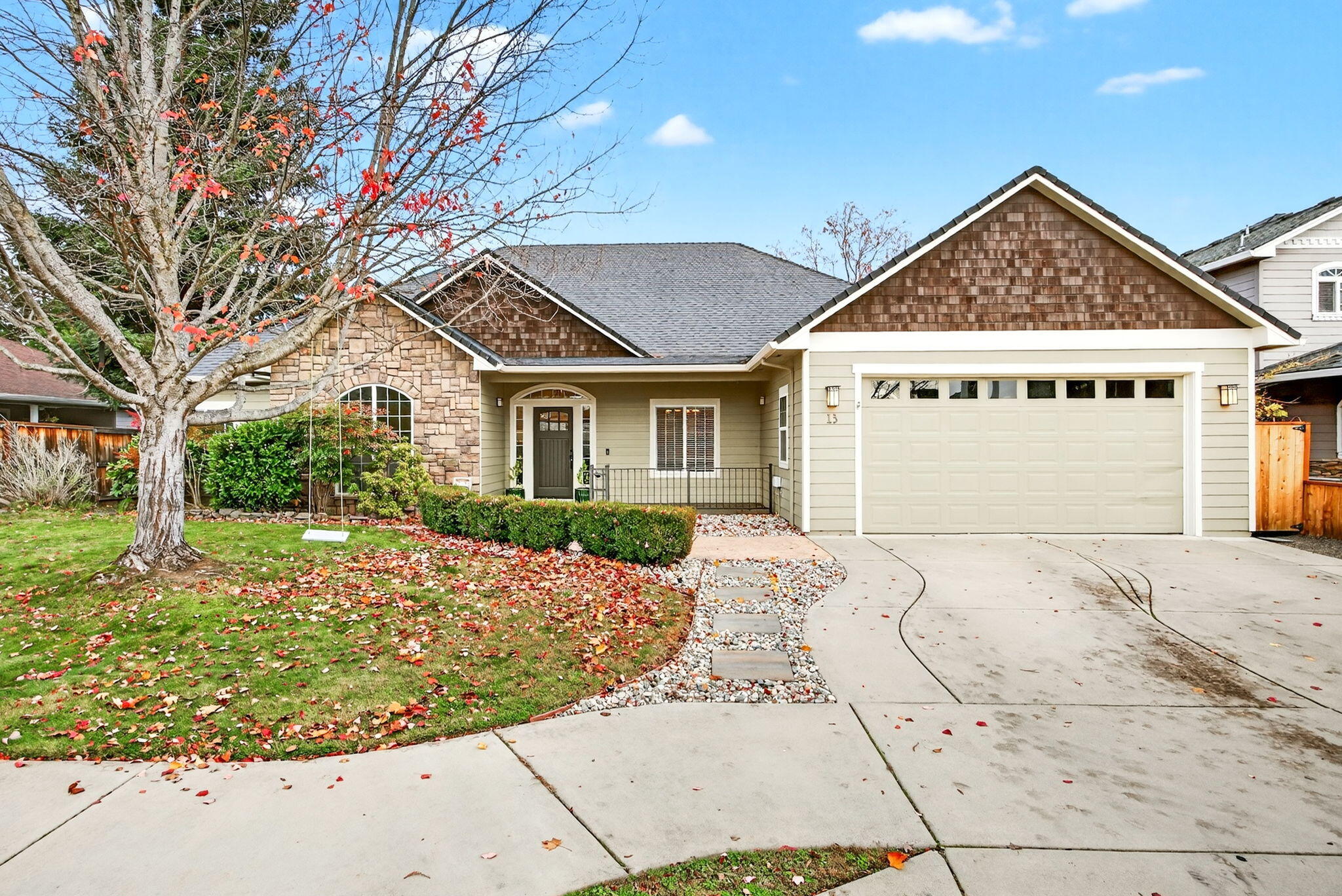 Beautifully refreshed single level home in the sought-after Echoes of the Ponderosa community, just steps from the Eagle Point Golf Course. This home features 4 bedrooms, 2 bathrooms and layout offers ideal separation of space with vaulted ceilings, hardwood floors, and a stunning stacked-stone gas fireplace anchoring the great room. Extensive updates include new interior & exterior paint, plush carpet and pad, LED lighting, window blinds, painted kitchen cabinets with new hardware, newer HVAC, new fireplace fan, new gate & fencing, improved landscaping, and fresh river rock and ¾ minus gravel. Spacious kitchen offers granite counters, island, gas range, and pantry. The generous primary suite boasts a slider to the covered back patio, walk-in closet, attached bathroom with dual sinks, tile floors, large soaking tub, and separate shower. Great landscaping with garden beds, cedar sauna and timed sprinklers. Finished 2 car garage. Move-in ready.