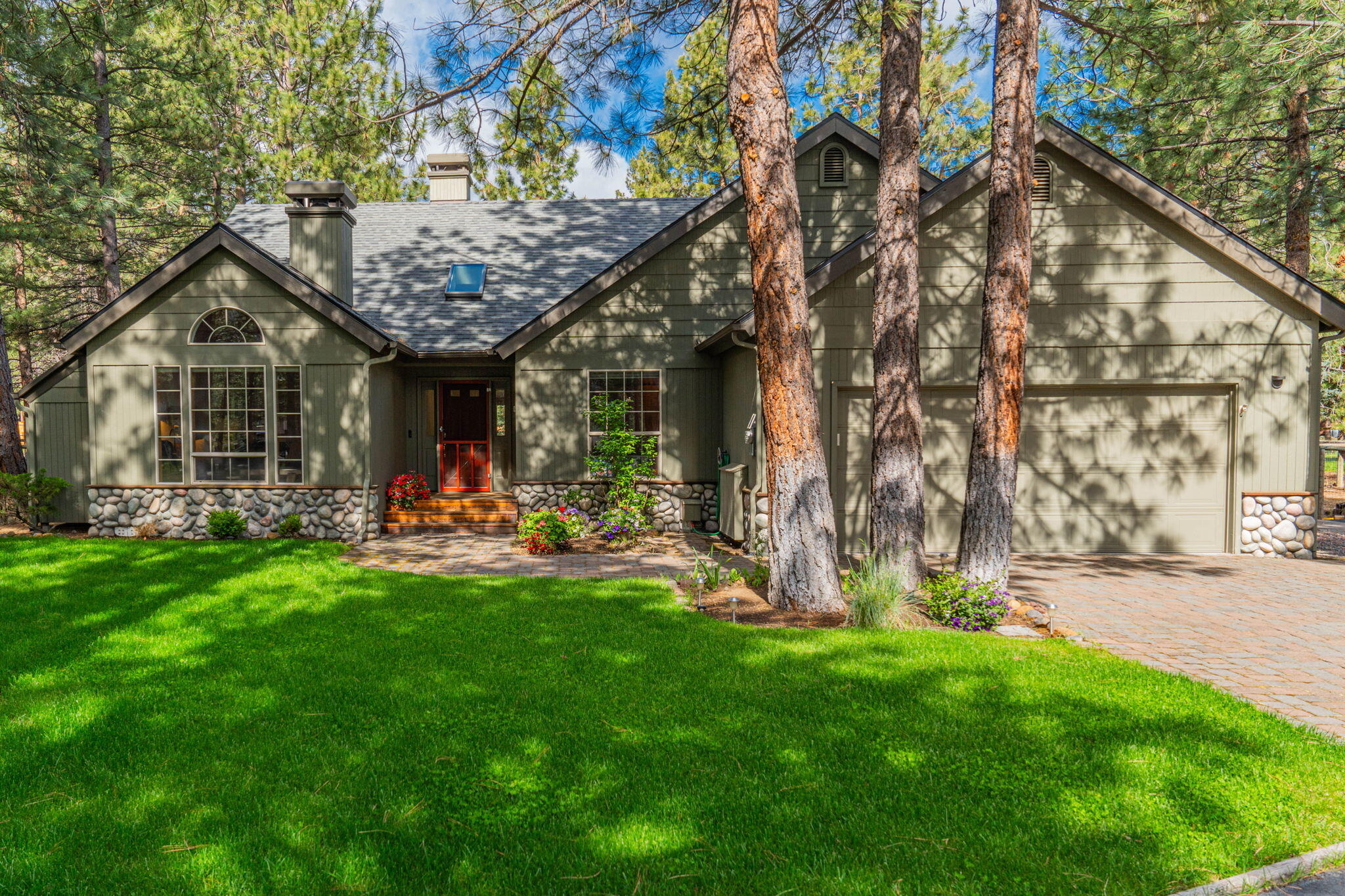 Designed for easy living, this 1,867 SF single-level home in Tollgate, Sisters, offers a layout that maximizes both space and functionality. Located on 0.64 acres, this residence features 3 spacious bedrooms and 2 full bathrooms, making it ideal for both relaxation and entertaining. As you step inside, you'll be captivated by the wood vaulted ceilings and wood floors that add warmth and character to the living space. The heart of the home opens up to a beautifully landscaped, fully fenced backyard, complete with a lush lawn, mature plants and trees that provide a serene backdrop. Enjoy outdoor living to the fullest with a wood deck designed for ample seating areas, perfect for gatherings or unwinding in the peaceful surroundings. Adding a touch of luxury, the hot tub is the perfect spot to relax after a long day. Tollgate amenities include a saltwater pool, playground, sport courts, rec hall, and snow removal. Schedule your viewing today and experience the best of Sisters living!