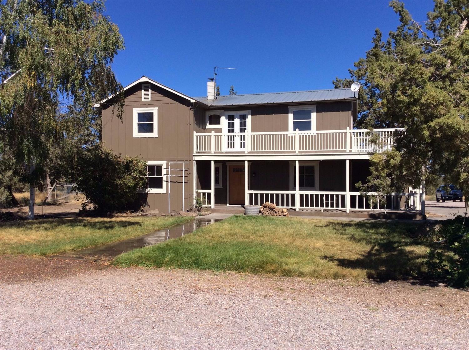 Very private, country setting. Just installed all new septic system. Siding, exterior paint and new balcony decking were installed last fall. Updated kitchen w/granite tile counters, nearly new pellet stove, & more.Use of brick, vintage doors & hardware, and stained glass. Claw foot tub in upstairs bathroom. Round pen, barn. Mature trees. Country living at it's best! Experience the privacy & quietness for yourself. Check out the drone video in Virtual media.Recent sale fail with an appraisal of $450,000.