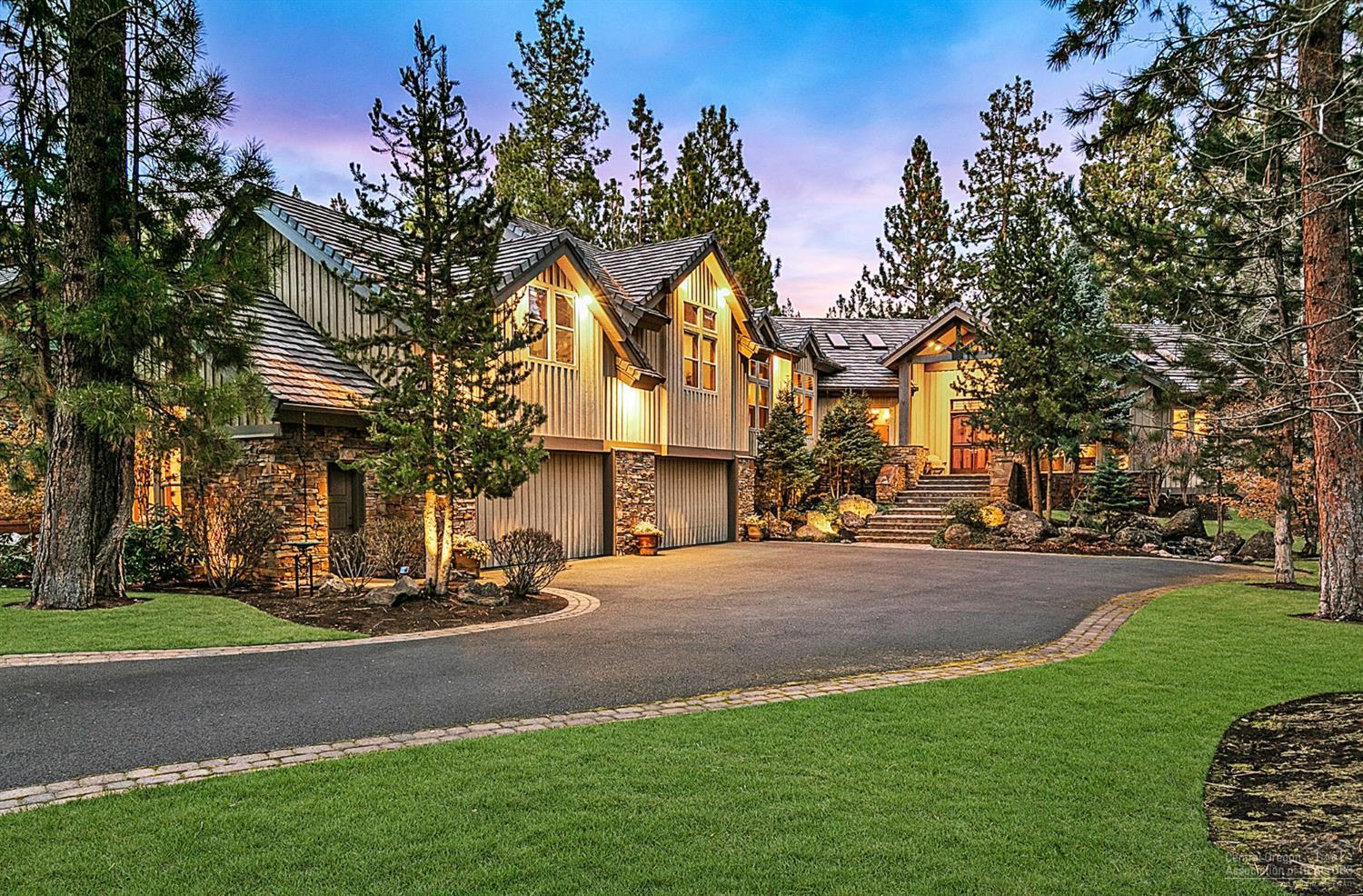 Immerse yourself in elegance. Privacy and golf course views define this gorgeous Broken Top estate. This home exudes pure class and Northwest comfort as you enter the foyer. The beautiful updated kitchen, separate dining, spacious family and living rooms make for easy and welcoming entertaining. Enjoy warm evenings on the enlarged patio with fire-pit and new outdoor kitchen. An impressive remodeled executive office is anchored in the master wing. The sprawling master suite with fireplace, private patio area, updated master bath and walk in closet complete this spa like retreat. With a thoughtfully designed en-suite guest bedroom as well as three additional bedrooms you'll have room for everyone. The private theater room perfect for movie screenings and the generous heated garage with 4 car capability round out this exquisite home. As rare as it is impressive, 61727 Tam McArthur showcases the finest finishes & attention to detail in a sought after private setting. We can FaceTime to