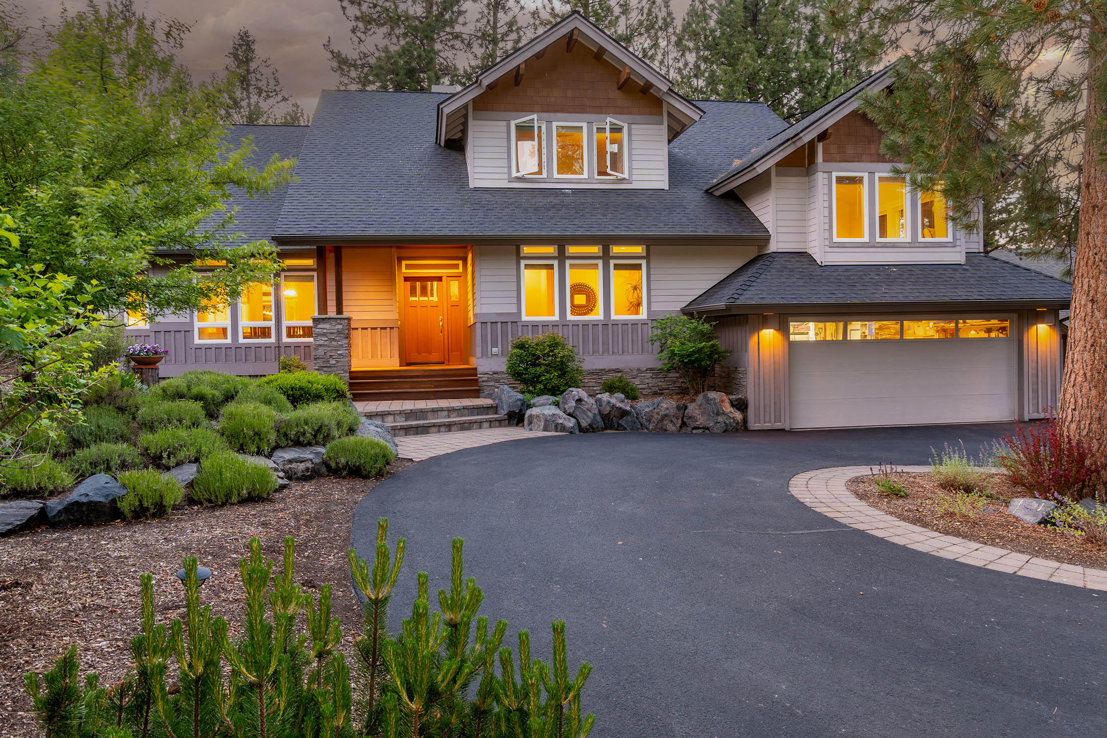 Live the dream in Awbrey Glen, one of Bend's Premier Gated Golf Communities, situated on the 6th Tee Box! Great room has Gleaming Red Birch Hardwood floors, Built-In cabinets with Glass Shelves, Warm Wood Ceilings & ''Walls of Glass'' overlooking the Patio and Golf Course. The Gourmet Kitchen features 6 burner gas cooktop, ''Dacor'' Oven and a center island with Stunning Granite Conglomerate & counter space Galore with Quartz. Dining rm is open to Kitchen & Great rm with Coved Lit Ceiling, Artistic Chandelier and Views of the front of the home. The Primary bedroom is on the Main Level with Warm Wood Ceilings, Door leading to Outdoor Hot Tub, Dual Vanities, Travertine Floors in Bathroom and Walk-in closet. Enjoy Outdoor entertaining on the Spacious Covered Wood Ceiling, Pavered Patio and Watch the golfers go by.  The oversized Tandem 3 car garage has a workbench and Storage Cabinets. Brand new Roof! Don't miss the opportunity to make this stunning home your own!