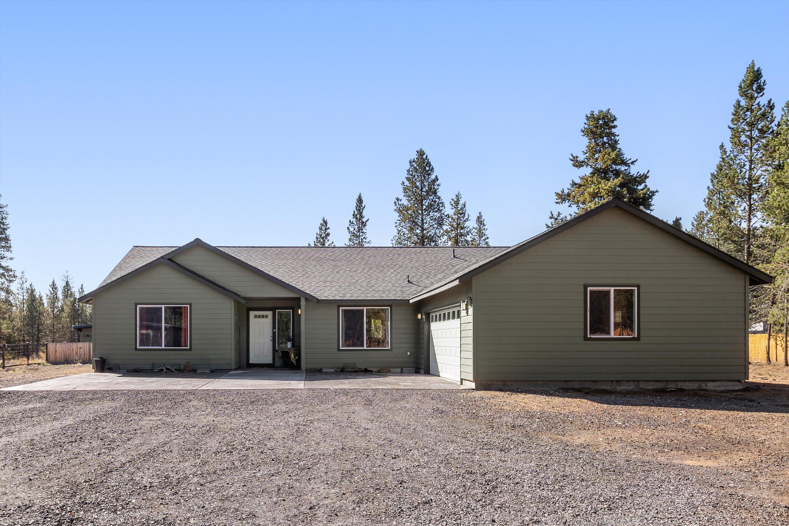 Beautiful 4-bed, 2-bath Highline custom home with 2,232 sq ft of well-designed living space on a low-maintenance 0.01-acre lot. Features a split living layout, cozy wood stove for cold winters and energy efficiency, and a spacious kitchen with premium finishes and a beverage/wine fridge. The primary suite includes heated bathroom floors for added luxury.
Enjoy a 20x40 greenhouse with water and power—perfect for gardening or storage—plus a 10x20  powered shed, chicken coop and 2 RV hookups for guests or extra flexibility. Irrigation in front and back yards, outdoor outlets, and a blank-slate yard ready for your custom design to make this property truly special.
This one-of-a-kind home blends modern indoor comfort with outdoor freedom. A must-see!