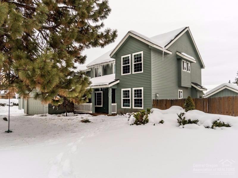 Rare find in Bend! This large 2701 Sq Ft home sits on over half an acre in town. Inside, this home feels higher end w/ beautiful hardwood flooring, granite counter tops, glass tile backsplash, formal dining room, office, bonus room & A/C. Master suite w/ large jetted tub & closet w/ built-ins. Triple car garage w/ a shop room, RV parking, water softener, plenty of storage & a large fenced back yard for kids & dogs to play. Just minutes to shopping & Bend activities. This perfect family home is a must see!