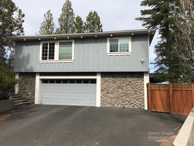 Presenting this large 2853 square foot, 4 bedroom, 3 bath home on a third of an acre with incredible views. Featuring vaulted and wood beamed ceilings. large windows to take in the light and views, hardwood floors, brick oven, fireplaces, tiled showers, large master with soaking tub, expansive decking and so much more.