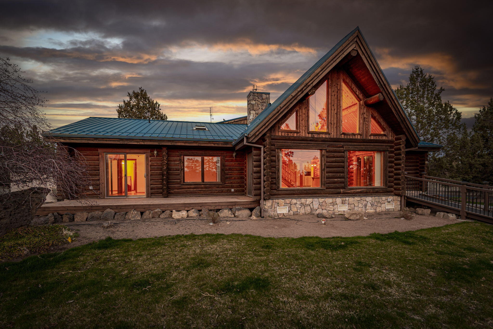 Welcome to this stunning property that captures the essence of the old wild West. Bordering public lands with breathtaking views of the Cascades, this property is perfect for equine enthusiasts, hobby farmers, off-road motorists, or anyone seeking privacy and natural beauty. The centerpiece of this property is a beautiful log home that exudes rustic charm and warmth. Inside, a cozy living space with stone fireplace, spacious kitchen with modern amenities & a primary suite with stunning views. A dream-come-true shop for any DIY'er includes guest quarters, epoxy floors & dedicated woodworking area. Don't forget the barn - a horse lover's paradise with stalls, small indoor arena, grooming & tack areas, plus an RV / storage bay. This is a rare opportunity to own a piece of the quiet rural life with all the modern amenities you could want. Start living the dream of country living with beautiful views & endless possibilities. (Loft or shop quest qtrs can be 3rd bedrm with closet addition.)
