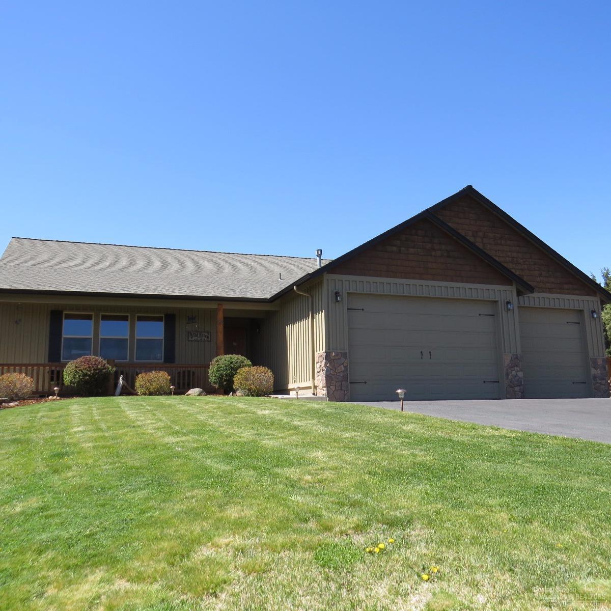 Gorgeous 3 bed 2 bathroom 1698 Sq Ft custom home on 5.8 acres. The kitchen features granite counters and propane appliances hickory floors and cabinetry. Vaulted ceilings, Fireplace. Large Master suite with outside door. Heat pump w/AC, The landscaped backyard is private includes a water feature and Double Patio 1000 sq ft outdoor entertaining. Must see.