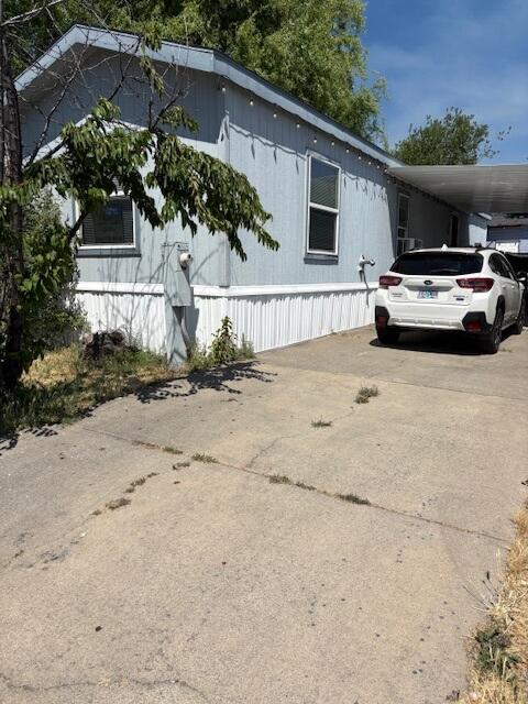 Affordable privacy to call your own!  built in 2013 home with 2 bedrooms one large bathroom, beautiful wood cabinets, wood trim, wood laminate look flooring,  pellet stove, air conditioning and central heat.  Large backyard with numerous shade trees including Hazlenut trees and a Cherry in the front yard! Two sheds and workshop plus extra small RV parking. The inside is super cute  and the backyard is SO private and shady! ,  In private remarks add that Rent includes water, sewer and garbage. Applications in Docs
_____________________________________________________ Possible owner financing