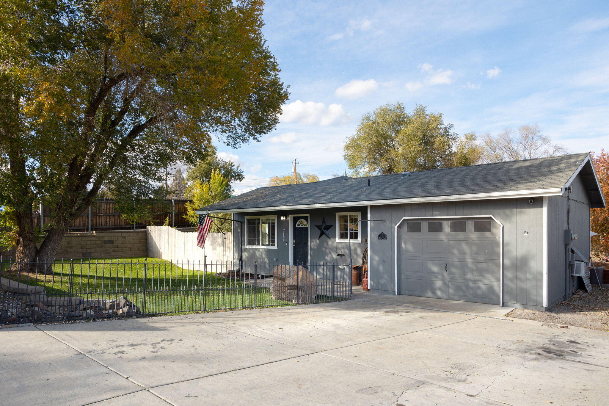 SELLER OFFERING $10,000 CREDIT! Truly enjoy the freedom of home ownership with this 4 bedroom, 2 bathroom home with no HOA or CCRs! Enjoy a fully fenced and private .18 acre corner lot complete with RV/boat parking, a storage shed and a fire pit. The one car garage is air conditioned, adding to the versatility, perfect for a year-around workspace or gym. Inside, you'll find a comfortable layout with spacious bedrooms ready for your personal touch and creativity. Located in SW Redmond, this home provides easy access to all of Redmond's amenities: shopping, dining, parks, and schools. To top it off, it is less than 1 mile away from the brand new recreation center scheduled to open early 2026! Homes like this don't come around often, don't miss your chance to make it yours!