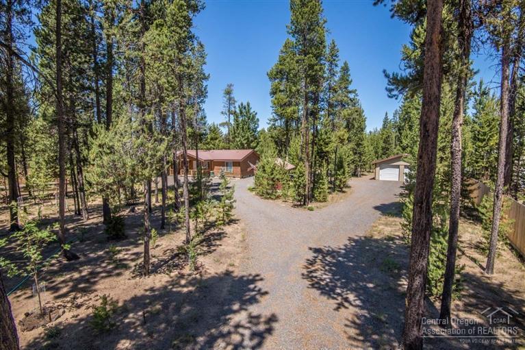 This is a gorgeous & pristine fully fenced 1+ acres with a circular driveway, full RV hookups, & a beautiful move in ready home. Enjoy the open floor plan, light bright rooms, large windows, a very secluded setting, the right amount of privacy fencing, a perfect blend of trees & clearings & an awesome 24x24 insulated garage with cement floor & power. Brand new H2O Kinnetico Water Softener, 50 gallon water heater, new cement patio with cover, the list is endless. This is truly worth the visit!