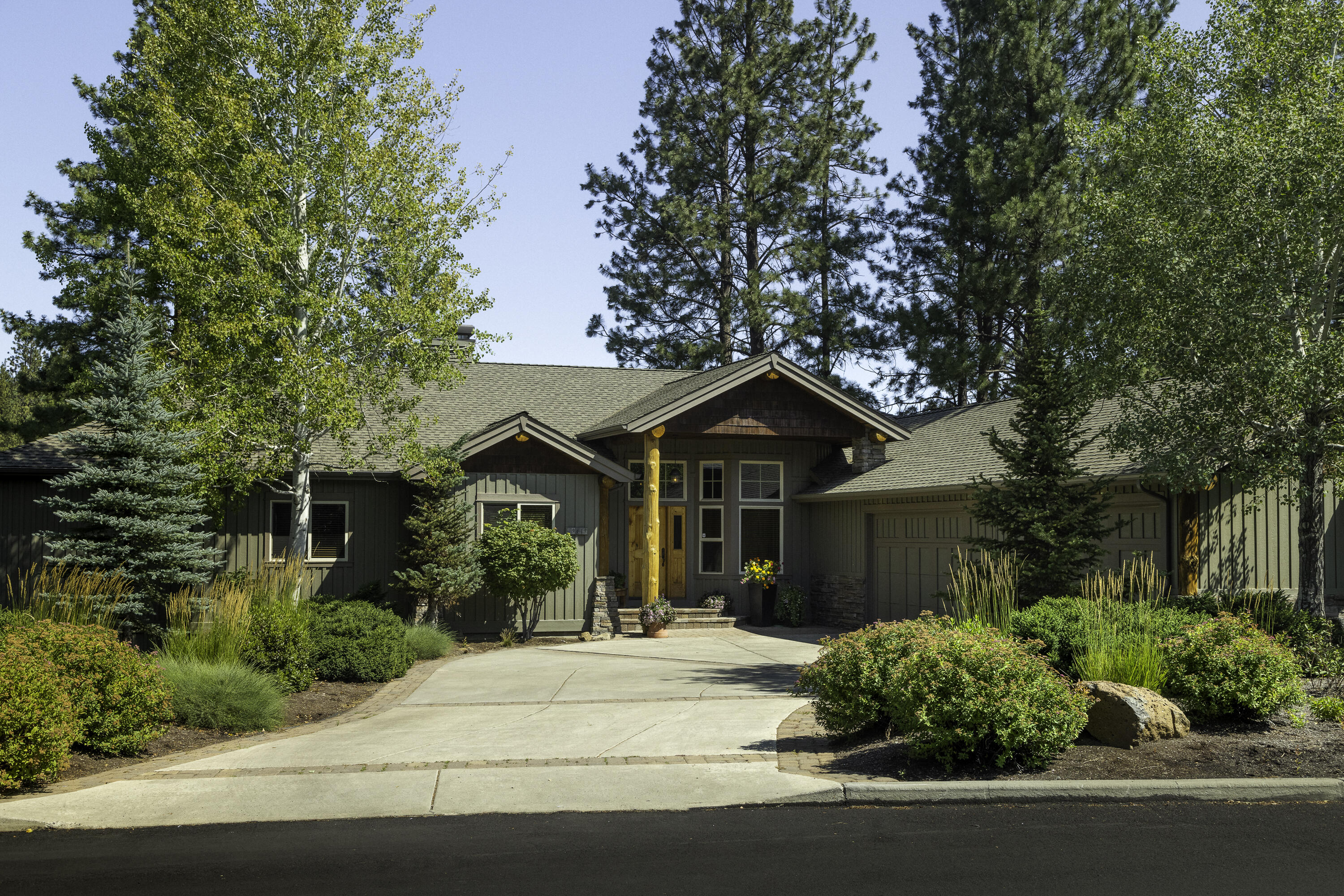 Single Level Custom, Deschutes River Views. Bright Open Floor Plan, Modern Mountain Design. In the Gated Enclave of River Rim. Three Bedroom, Three Full Baths, Three Car Garage, Dedicated Formal Office with Built-Ins. Views from Great Room, Media Room, Kitchen, Master Bedroom. Enjoy the Sounds  of the Rapids while Entertaining from the Spacious (1300sqft) Paver Deck. Soaring Fireplace in the Den/Great Room. Utility Room & Formal Dining, Extra High Ceilings. Media Room has Windows to the Vaulted Ceiling. The Kitchen Features Concrete Counter-Tops, Wood Floors, Quality Cabinetry, Dining Nook and Stainless Monogram Appliances. Walk to Multiple Parks, the River Trail, Elk Meadow Elementary School, Acres of Exclusive Common Areas with Wild Meadows, Miles of Trails, and Shopping Center. Oversized, Extra Deep 3-Car Garage with Custom Cabinetry and Epoxy Flooring. 500 Square Foot Insulated Work /Storage Area with Separate Entrance. Central A/C and Plumbed for Central Vac.