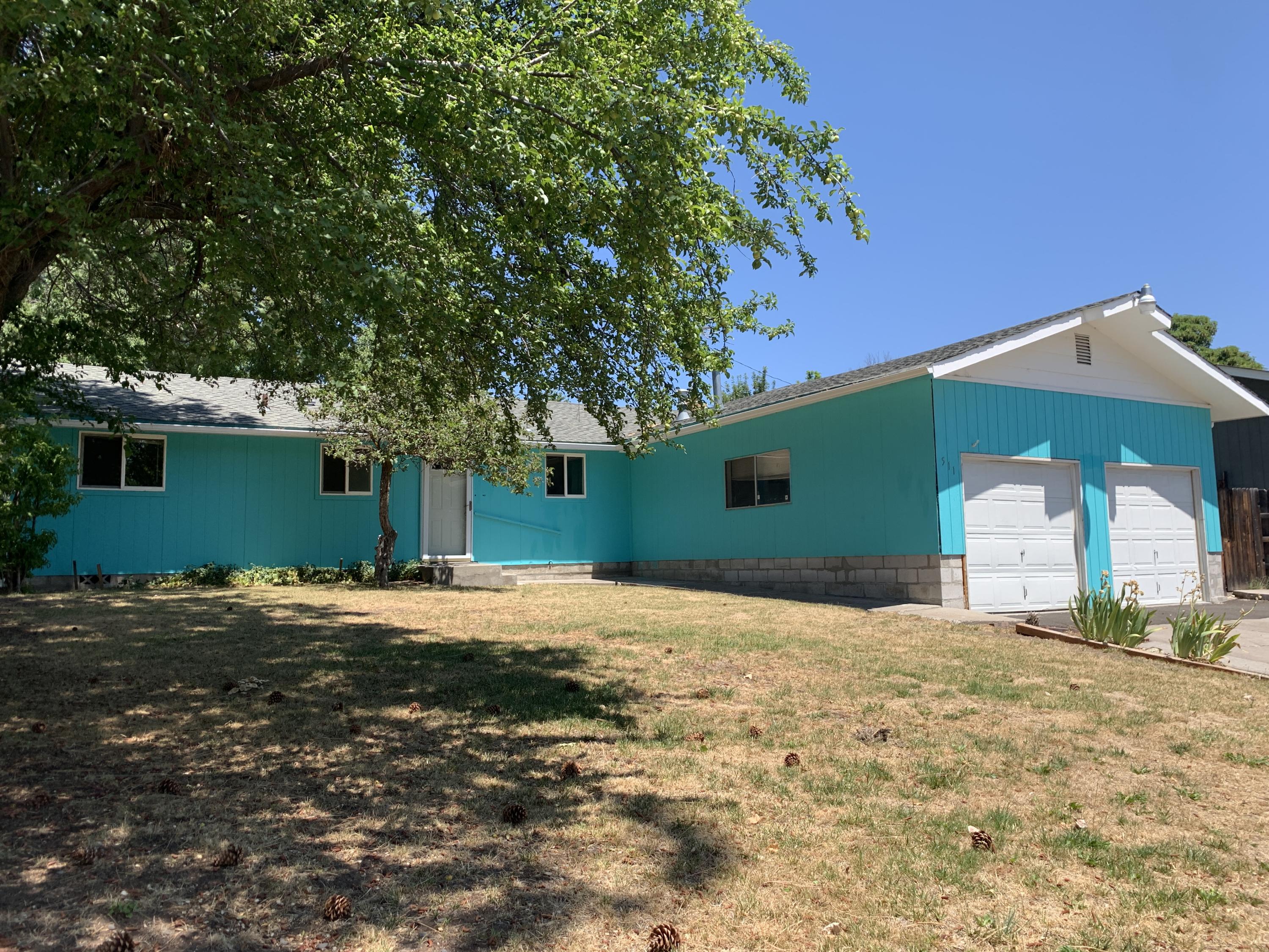 Wonderful 3 bedroom/1.5 bathroom home with attached, oversized 2 car garage! Located in a quiet neighborhood, this property features a nicely-sized front yard and wonderfully private, fenced backyard including a great storage shed, small fire pit area and room for gardening and entertaining. Inside boasts a great kitchen with gas range, large living area open to kitchen and dining area and tons of natural light from large windows. Separate laundry room with half bath located off garage. Bedrooms are nicely-sized with good closets. This one is ready for you to move right in! Schedule your appointment today.