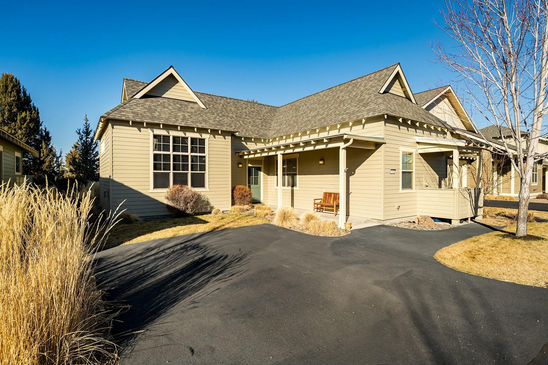 Nestled in the sought-after Eagle Crest community, this impeccably maintained single-level home offers a perfect blend of comfort and convenience. The living room offers hardwood floors and high ceilings, bathing the home in natural light, creating an open and airy atmosphere. The back patio is ideal for outdoor dining in the summer, entertaining, or simply enjoying the peaceful surroundings. Residents of Eagle Crest enjoy access to a wealth of amenities, including three golf courses, a pool, fitness center, tennis and pickleball courts, and much more. Whether you're seeking a turn-key short-term rental investment or a tranquil new home, this property offers tremendous potential.